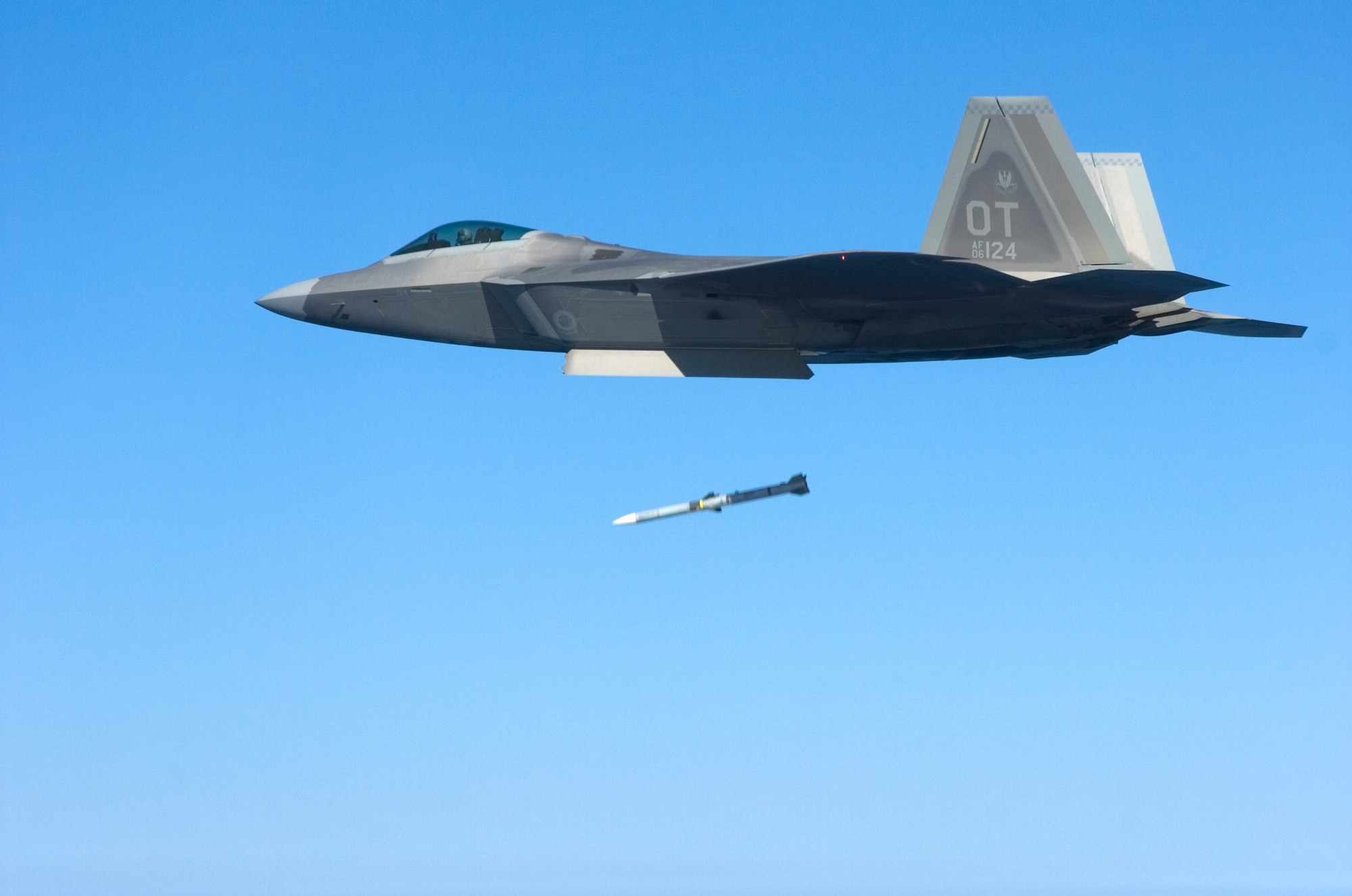 An F-22 from the 422nd Test and Evaluation Squadron, fires a missile over the Gulf of Mexico during a Combat Archer mission March 18 at Tyndall Air Force Base, Fla. The Weapons System Evaluation Program also known as Combat Archer, evaluates live air-to-air firing scenarios from beginning to end. The program covers missile movement from armory to the aircraft to all the tactics and procedures that must be used before releasing a live ordnance. This WSEP was a unique opportunity for the 83rd Fighter Weapons Squadron to evaluate a unit within its own wing. All aircraft and personnel involved belong to the 53d Wing. U.S. Air Force Photo/ Tech Sgt. Jason Wilkerson. 