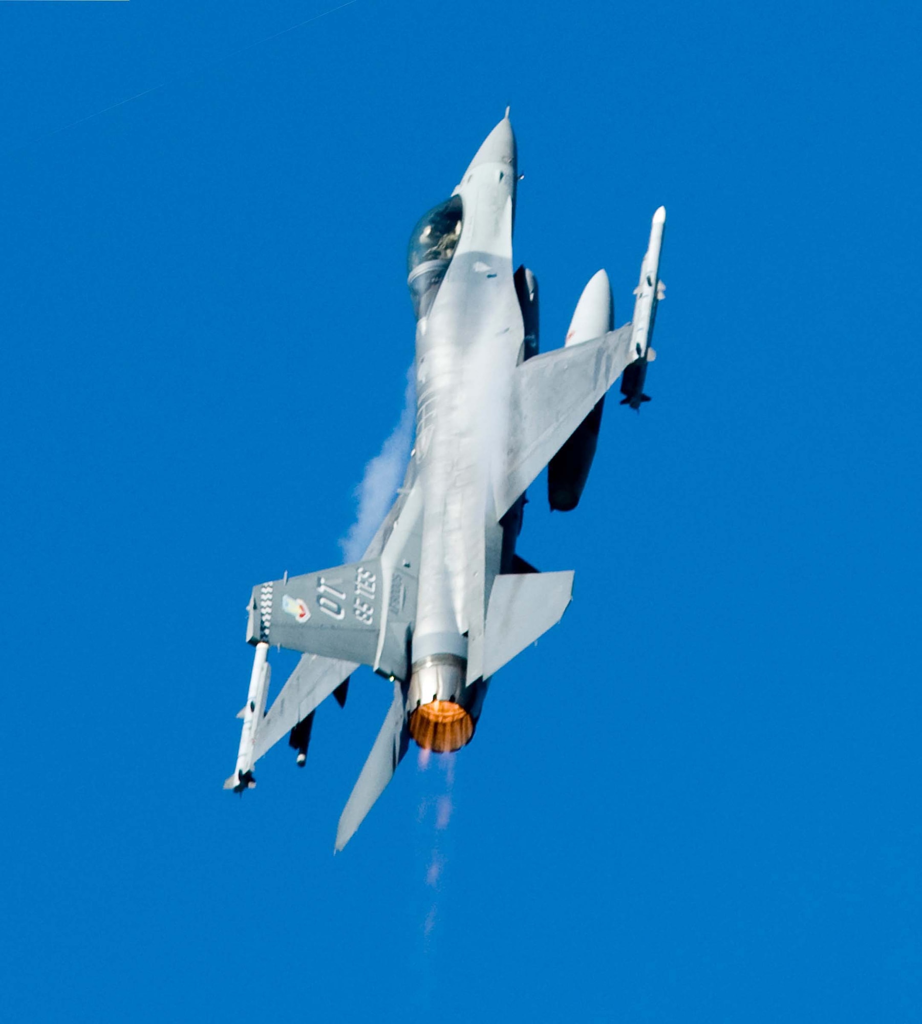 EGLIN AIR FORCE BASE - Lt. Col. Sam Shaneyfelt, 85th Test and Evaluation Squadron operational test pilot, takes his F-16 Viper vertical during a test mission. The 85th TES pilots test new capabilities for F-15s and F-16s in an combat-simulated scenarios. (U.S. Air Force photo)