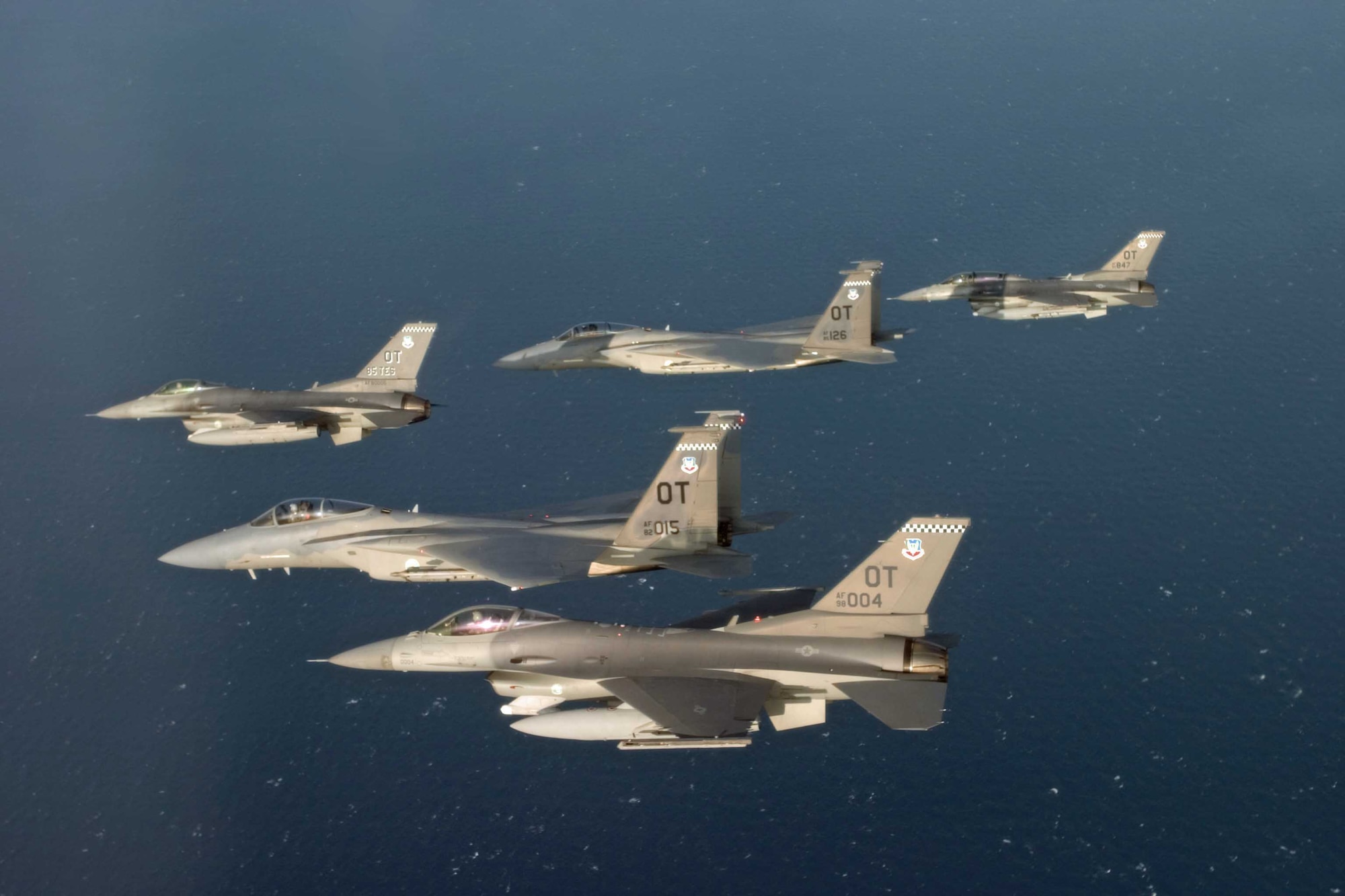 EGLIN AIR FORCE BASE, Fla. - Aircraft of the 85th Test and Evaluation Squadron fly over the Gulf of Mexico. The test squadron flies the F-15C Eagle, F-15E Strike Eagle and F-16 Viper aircraft. (Jake Melampy/Courtesy photo)