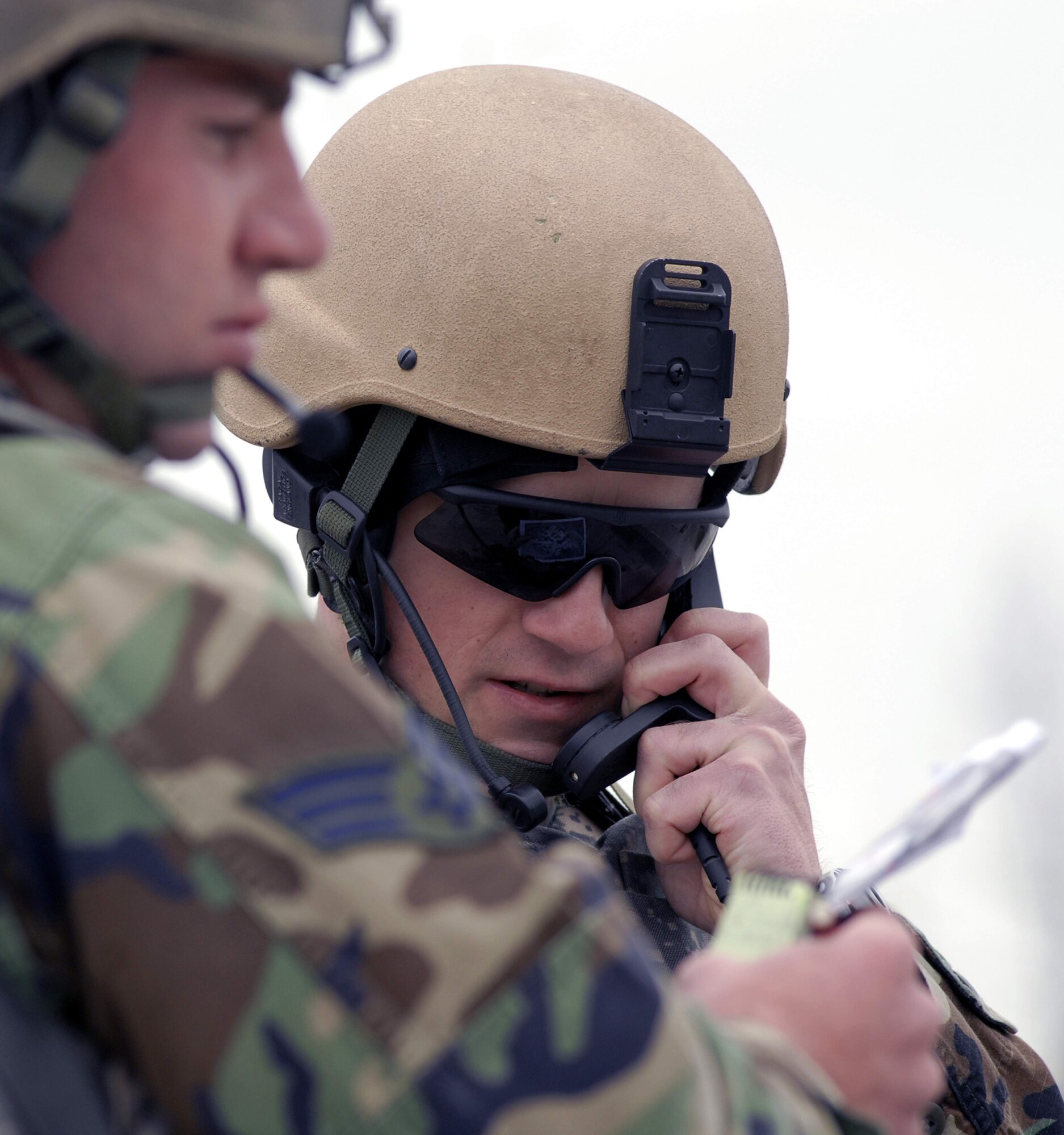 Airmen in the Patriot 7 course at Fort Pickett, Va, call in air support from F-15E Strike Eagles circling overhead during an exercise. The exercise teaches students how to use remote operated video enhanced receiver systems.  The five-day course is designed to train Airmen on how to better integrate intelligence, surveillance and reconnaissance tools into their missions. (U.S. Air Force photo/Staff Sgt. J.G. Buzanowski)