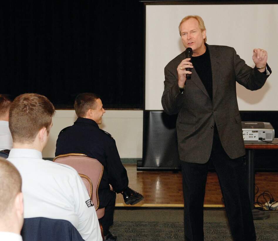 Dan Clark, motivational speaker, former athlete and main contributor  to the Chicken Soup for the Soul series, talks to Team Andrews Members in the Community Activity Center Monday. Mr. Clark travels around the world talking to military members about the need to remember why they serve America. (U.S. Air Force photo/ Senior Airman Giang Nguyen)