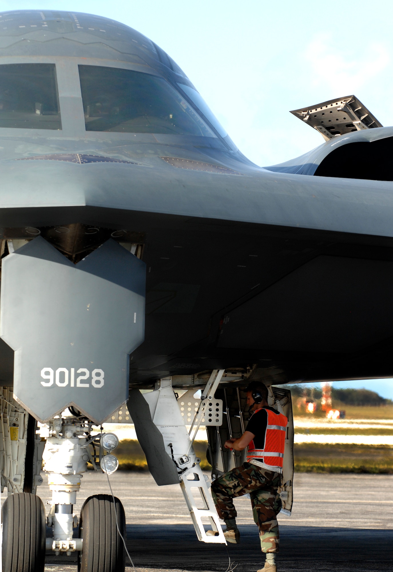 Airman 1st Class Joshua Silva prepares to help launch a B-2 Spirit during Exercise Polar Lightning March 12 at Andersen Air Force Base, Guam. B-2s are deployed here from Whiteman AFB, Mo., as part of a regularly scheduled air and space expeditionary force rotation to the Pacific. Airman Silva is a 36th Expeditionary Maintnenance Squadron crew chief. (U.S. Air Force photo/Senior Airman Ryan Whitney) 
