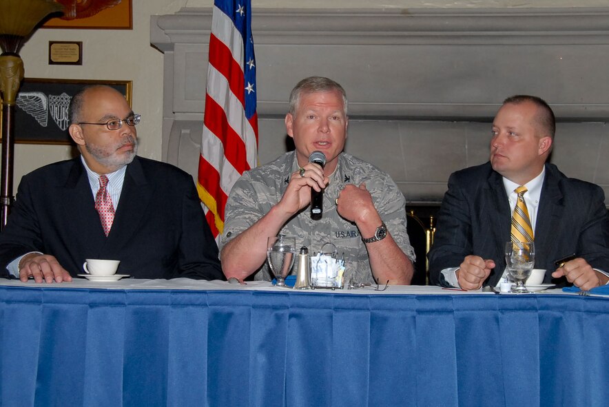 Col. Joseph Dent, Staff Judge Advocate General, addresses the audience during this year's Judicial Breakfast at the Maxwell Officers' Club, March 9. Also shown are Judge Wallace Capel (left), U.S. Magistrate Judge for the Middle District of Alabama in Montgomery and Capt. Keith Barnett, Montgomery Police Department. The breakfast is an annual event hosted by the International Officer School, for the purpose of acquanting international students with the American judicial system. (U.S. Air Force photo by Jamie Pitcher)
