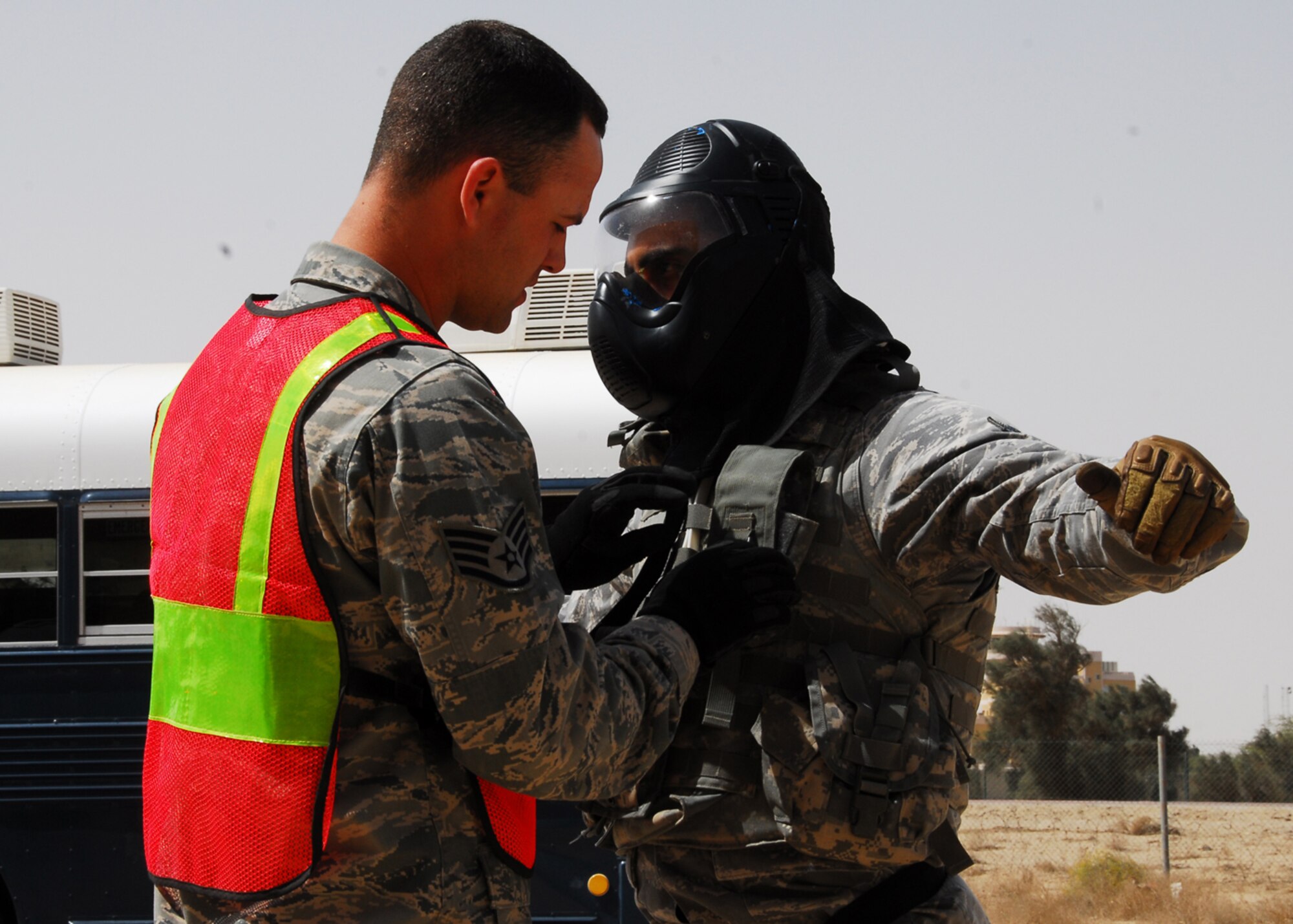 SOUTHWEST ASIA -- Staff Sgt. Hunter Harper, 386th Expeditionary Security Forces Squadron, performs a live ammunition inspection on a fellow security forces member before engaging in a Close Quarter Battle drill at an air base in Southwest Asia, March 18. The inspection is a safety precaution to ensure there is no live ammunition rounds used during the training. Sergeant Harper is currently deployed from Eglin Air Force Base, Fla. and is originally from Greenwood, Miss. (U.S. Air Force photo/ Senior Airman Courtney Richardson)