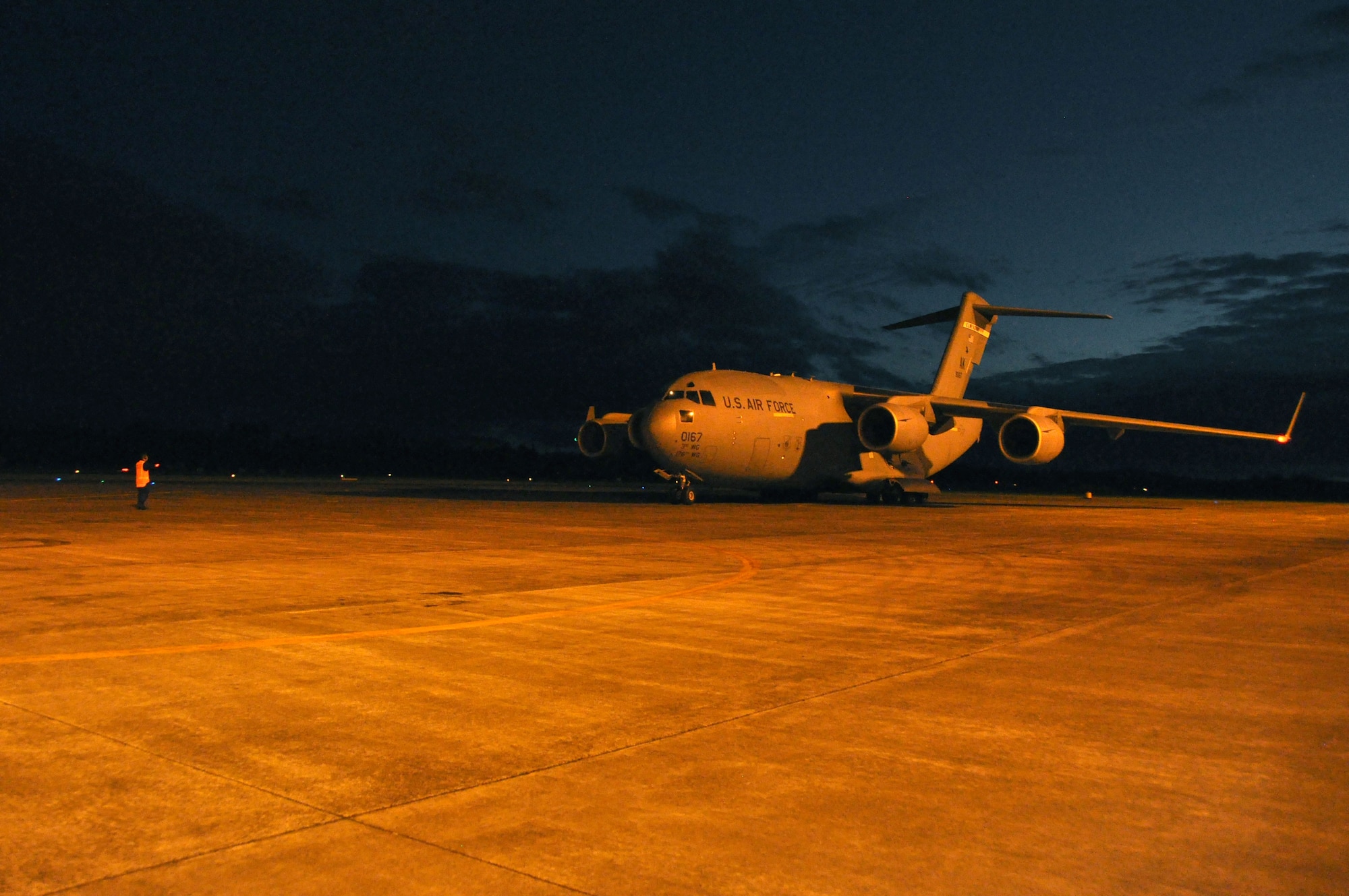 WHENUAPAI AIR BASE, New Zealand  -- A C-17 Globemaster from the 3rd Wing, Elmendorf Air Force Base, Alaska, arrives March 18 to Royal New Zealand Air Force here to participate in the Whenuapai Air Show. This will be the first time since 1981 that a U.S. aircraft has participated in the annual show. (U.S.  Air Force photo/Tech. Sgt. Cohen A. Young) 