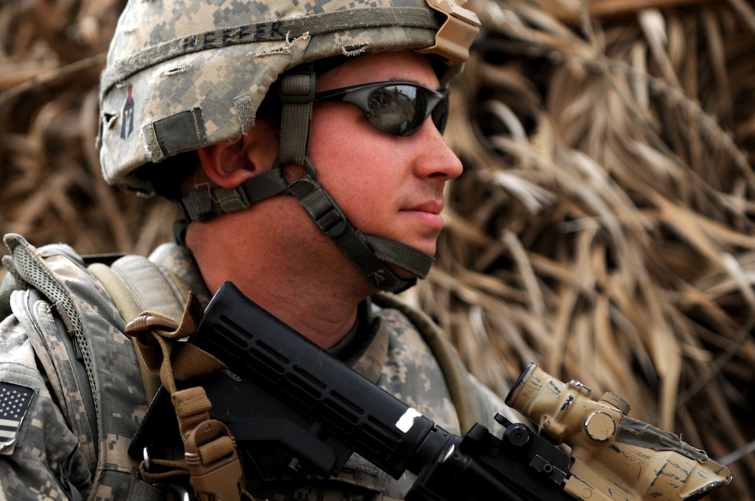 U.S. Army Pfc. Gary Keefer provides security while on a dismounted patrol with his platoon through the Al Faris neighborhood in Northwest Tarmiyah, Iraq, March 13, 2009. Keefer is assigned to Company C, 1st Battalion, 111th Infantry Regiment, 56th Stryker Brigade Combat Team, 28th Infantry Division, Pennsylvania National Guard, Multinational Division Baghdad.