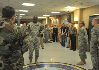 Major General Abraham J. Turner, and Command Chief Master Sgt. Thomas S. Narofsky, recognize U.S. Strategic Commands March promotees Friday.<br /><br />The promotees for March are:<br /><br />Col. Ronald Grove<br />Maj John Weaver<br />Master Sgt. Herminio Garcia<br />Technical Sgt. Regis Vega<br />Technical Sgt. April Dobson<br />Staff Sgt. Gerald Bonifacio<br />Staff Sgt. Joshua Van Johnson<br />Senior Airman Amber Zulueta<br />Senior Airman Evan Phinney<br />Senior Airman Matthew Hogan<br />Senior Airman Kalem Matthews<br />Senior Airman Kevin Flanagan<br />Senior Airman Jeremiah Hayes<br />Senior Airman Leslie Musil<br />Senior Airman John Simon