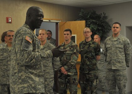 Major General Abraham J. Turner, and Command Chief Master Sgt. Thomas S. Narofsky, recognize U.S. Strategic Commands March promotees Friday.<br /><br />The promotees for March are:<br /><br />Col. Ronald Grove<br />Maj John Weaver<br />Master Sgt. Herminio Garcia<br />Technical Sgt. Regis Vega<br />Technical Sgt. April Dobson<br />Staff Sgt. Gerald Bonifacio<br />Staff Sgt. Joshua Van Johnson<br />Senior Airman Amber Zulueta<br />Senior Airman Evan Phinney<br />Senior Airman Matthew Hogan<br />Senior Airman Kalem Matthews<br />Senior Airman Kevin Flanagan<br />Senior Airman Jeremiah Hayes<br />Senior Airman Leslie Musil<br />Senior Airman John Simon
