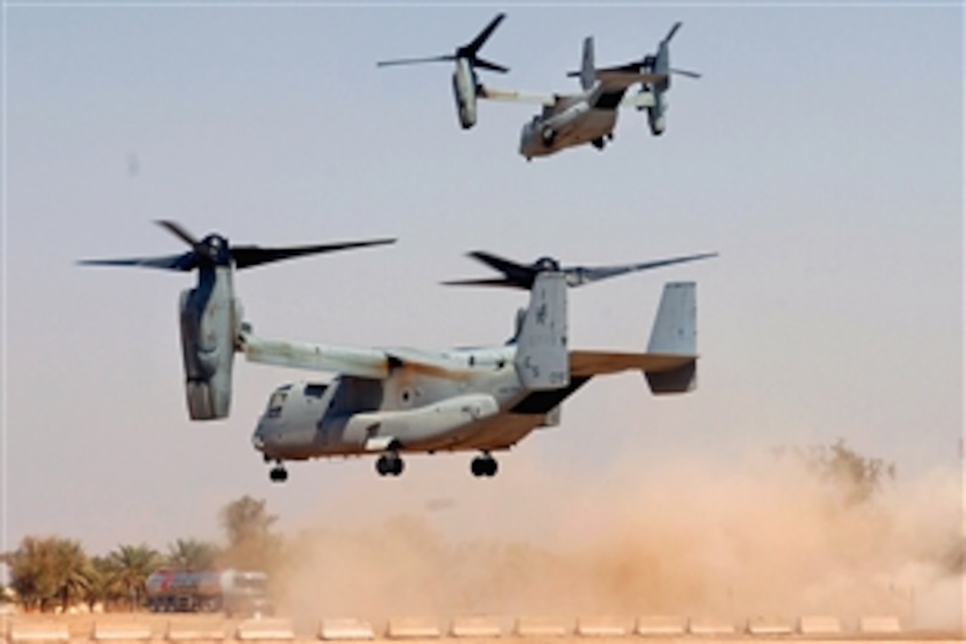 Two U.S. Marine Corps MV-22 B Osprey tilt-rotor aircraft take off from Camp Liberty Command Pad, Iraq, March 19, 2009. When it comes to how it flies, the Osprey combines the best of both worlds with the ability to take off and land like a helicopter and the added feature of flying through the air like a plane. 