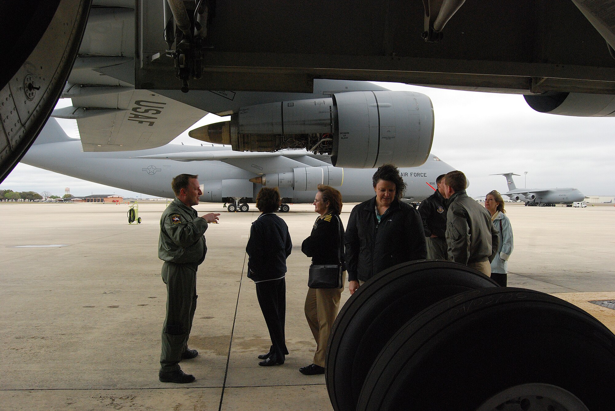 Civic leaders and Reservists from Dobbins ARB, Ga. visited the Alamo wing on a tour of area Reserve component units.The group traveled to Lackland AFB via C-130 and then spent two days touring several military component's Reserve forces. Civic leader tours allow civilian stakeholders a chance to see what Reservists bring to the fight. This tour gave them the oportunity to get up close and personal to an Alamo Wing's C-5A Galaxy while Reserve air crew members from the 433rd Airlift Wing answered questions about the C5.(U.S. Air Force Photo/Airman Brian McGloin) 