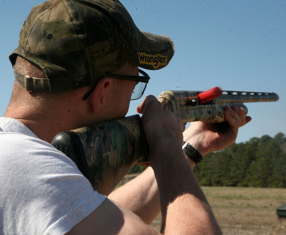 Lance Cpl. Carl Kindal, a motor transport mechanic, shoots trap, at the McIntyre Skeet and Trap Range.  The range maintains five skeet fields and two trap ranges for recreational shooting. (Official U.S. Marine Corps photo by Lance Cpl. Melissa A. Latty) (RELEASED