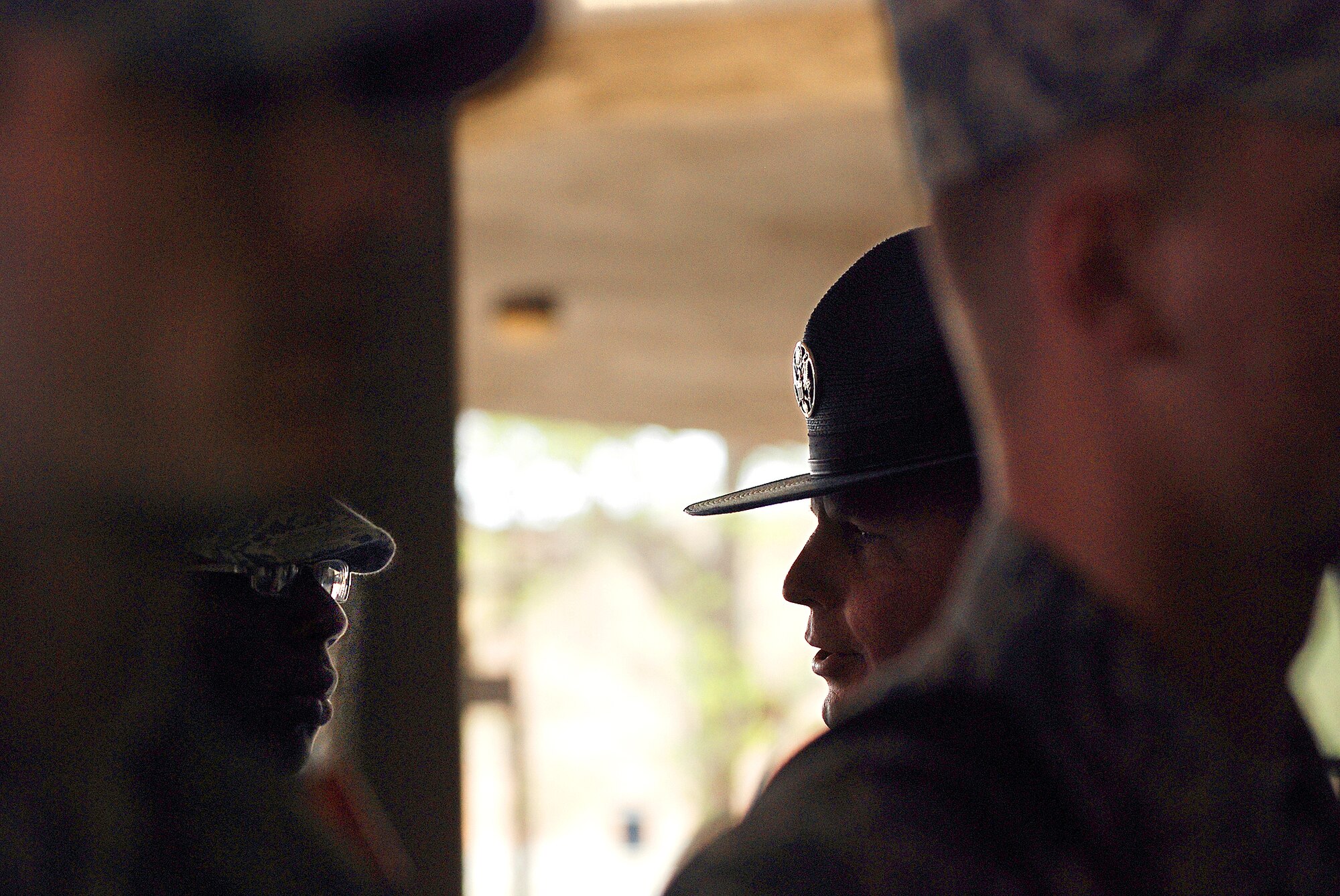 Technical sergeant Terrance Thoe, a Reservist Military Training Instructor from the 433rd Airlift Wing, provides guidance to a basic trainee in the 433rd Training Squadron at Lackland AFB. Reservists like Sergeant Thoe work side by side with active duty MTI's to train and instruct America's future Airmen. (U.S. Air Force photo/Airman Brian McGloin)