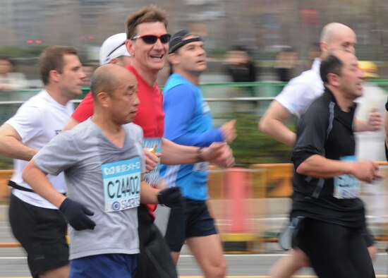 TOKYO -- Tech. Sgt. Richard Vandyke, 374th Aerospace Medicine Squadron and Yokota Striders Running Club member (red shirt), was one of 35,000 runners to participate March 22 in the 2009 Tokyo Marathon. He completed the 26.2-mile course in 3 hours, 42 minutes, 47 seconds. (U.S. Air Force photo/Airman Devin Doskey)