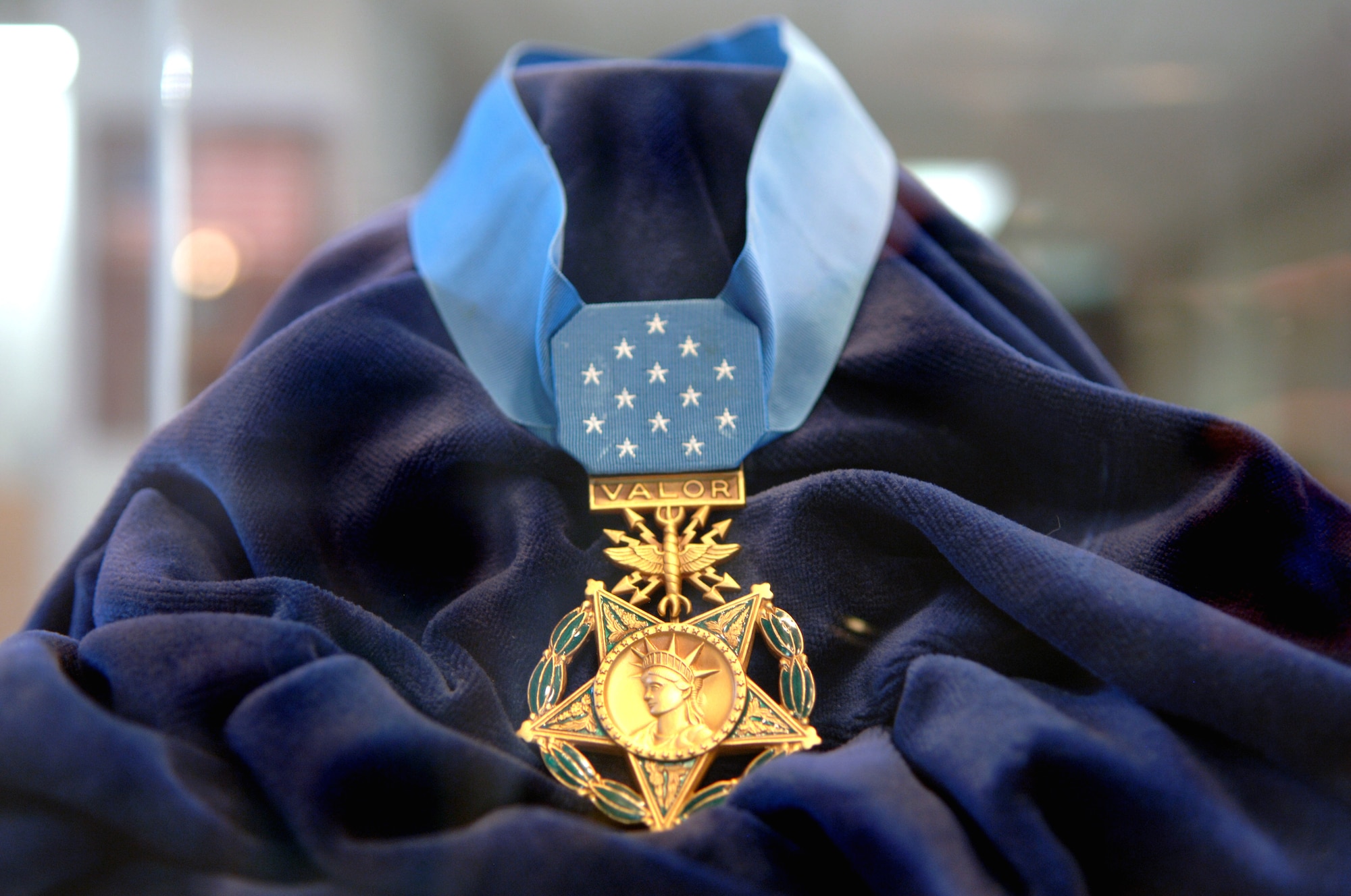 The Medal of Honor is the highest military decoration awarded by the United States government. It is bestowed on a member of the United States armed forces who distinguishes himself "conspicuously by gallantry and intrepidity at the risk of his life above and beyond the call of duty while engaged in an action against an enemy of the United States." Because of the nature of its criteria, the medal is often awarded posthumously. (U.S. Air Force photo/Airman 1st Class Veronica Salgado)

