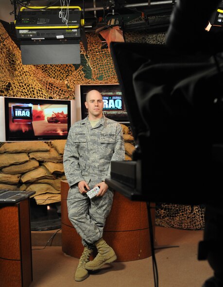 Senior Airman Tyler Alexander, a broadcaster with the American Forces Network-Iraq, reads from a teleprompter during a broadcast March 4 in Baghdad. Sergeant Alexander is deployed from Wiesbaden, Germany. (U.S. Air Force photo/Senior Airman Tiffany Trojca)