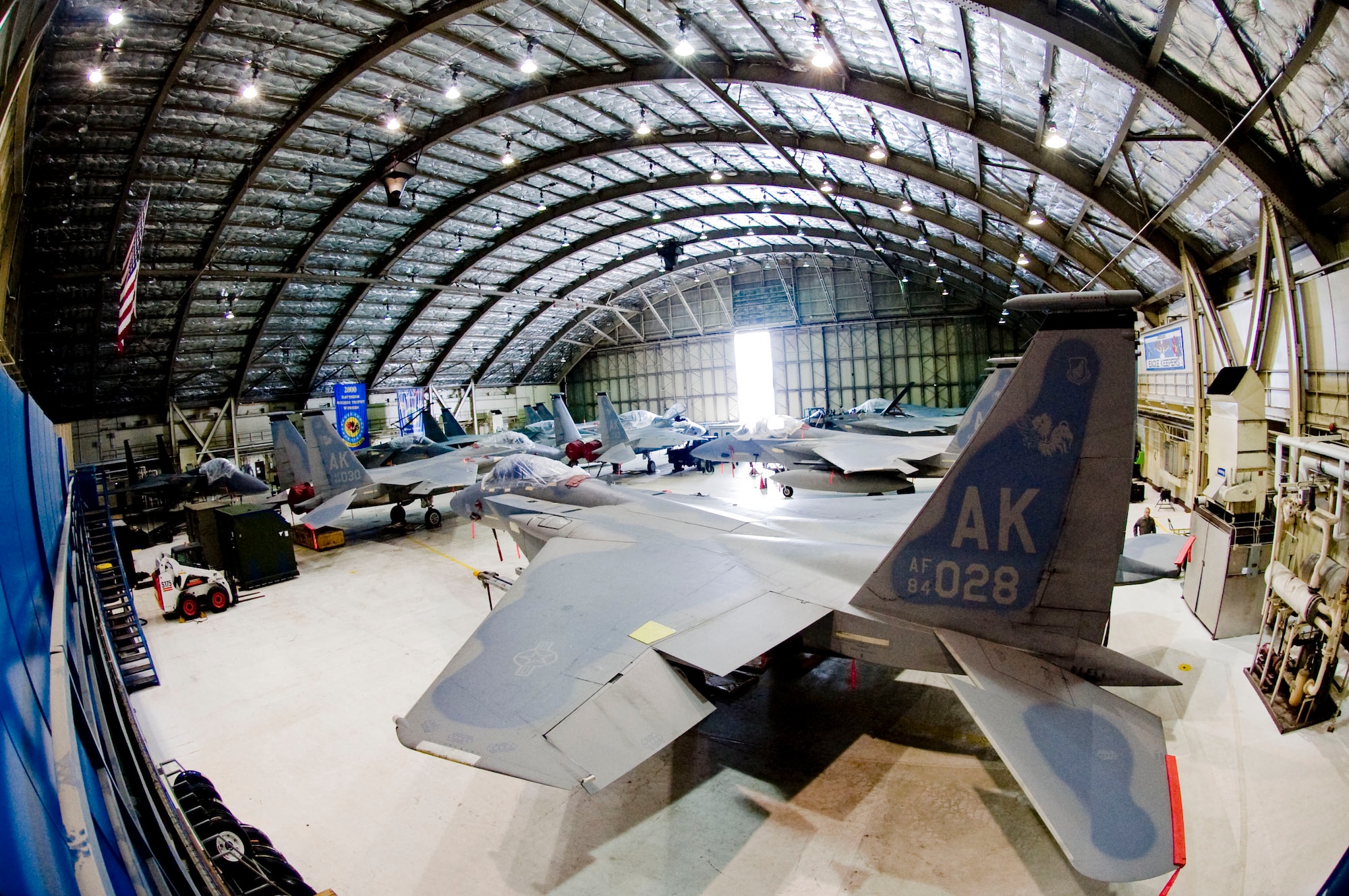 ELMENDORF AIR FORCE BASE, Alaska-- F-15s and maintenance equipment from the 19th Fighter Squadron are sheltered inside the hanger due to the March 23 eruption of Mount Redoubt. Aircraft on Elmendorf are being sheltered in place and plans are being made to close the airfield if necessary. (U.S. Air Force photo by Senior Airman Jonathan Steffen)


