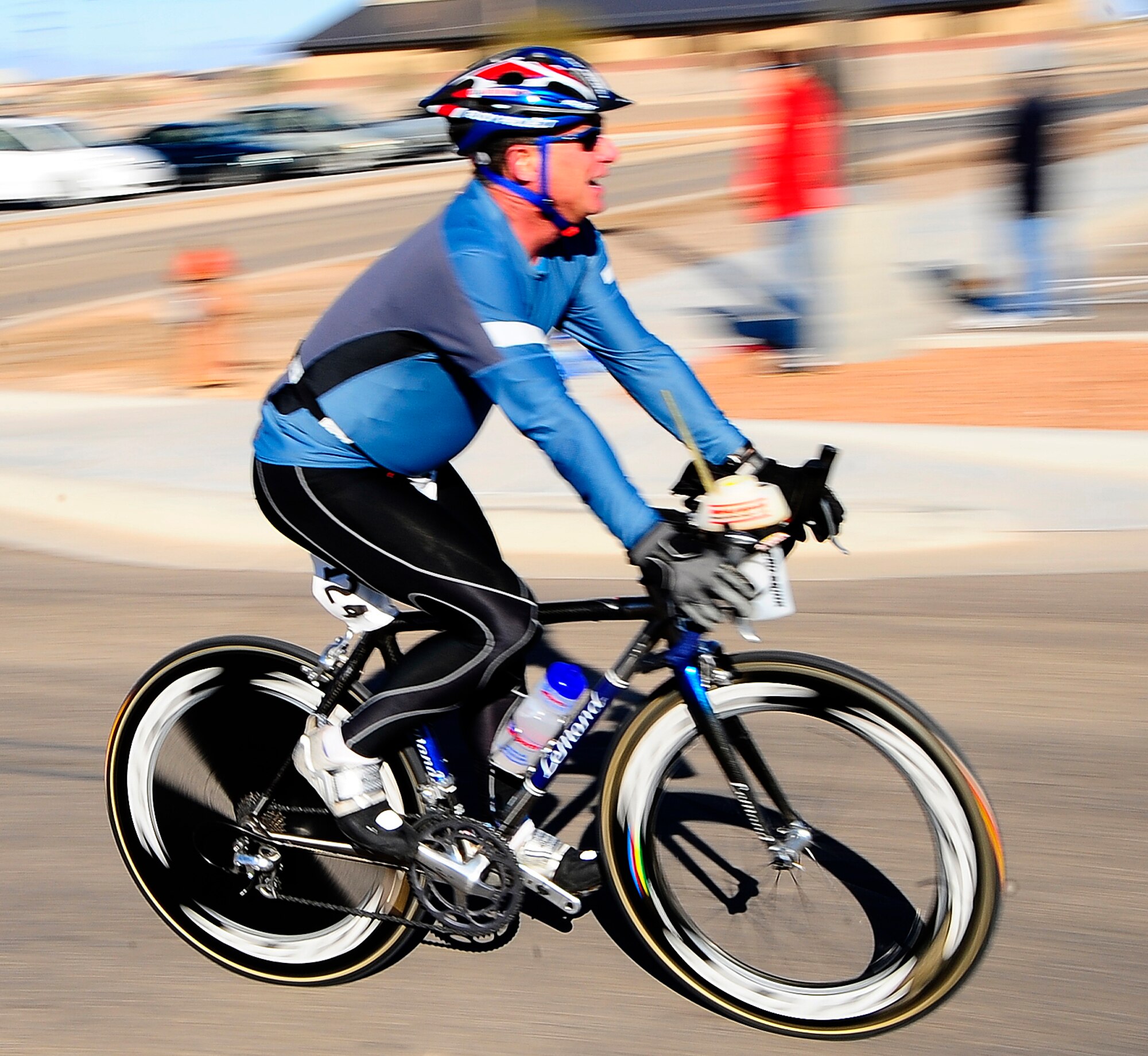 Mr. Thom Stein crosses the finish line after completing the Raptor Duathlon, March 15. The Holloman Sports and Fitness Center sponsored the competition in which more than 80 participants competed. (U.S. Air Force Photo/TSgt Chris Flahive)