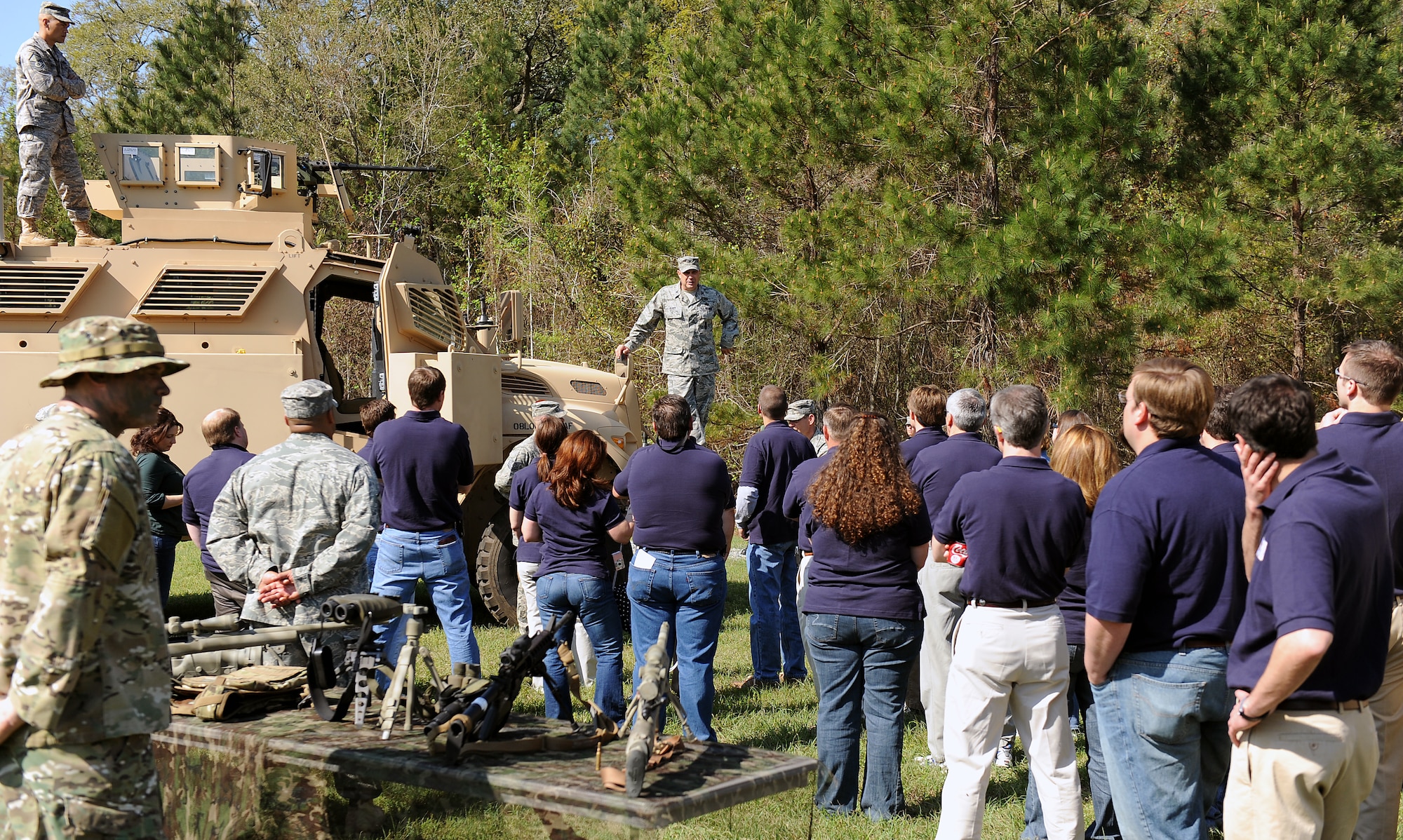 MOODY AIR FORCE BASE, Ga. -- Colonel Donald Derry, Commander of the 820th Security Forces Group commander, speaks to members from the Leadership Lowndes class about the Mine Resistant Ambush Protective vehicles and how they supplement the Humvee in wartime situations here March 11. (U.S. Air Force photo by Airman Joshua Green)
