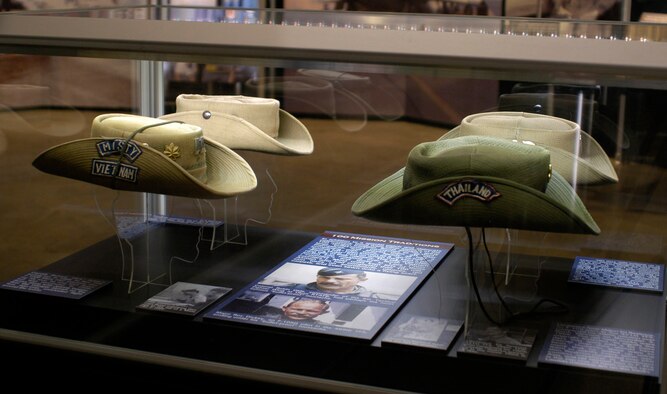 DAYTON, Ohio - Capt. Richard “Dick” Rutan’s boonie hat (front left). In 1968, he flew 105 F-100F Misty FAC missions. During his tour, he was shot down, but was recovered. In 1986, Rutan, along with Jeanne Yeager, flew the Voyager aircraft on the first, non-stop, unrefueled flight around the world. Col. Larry Bogemann, an F-105 pilot in the 34th TFS, 388th TFW, kept track of his missions on this boonie hat (back left). Capt. Robert Bradshaw, an F-105 pilot in the 354th TFS, 355th TFW, decorated his hat with metal pull tabs from beverage cans (back right). During his tour from September 1966-May 1967, he flew 108 combat missions. The “6A” was for missions near Hanoi in Route Pack 6A, “NVN” was for missions in other parts of North Vietnam, and “NC” meant “non-counters” in Laos. The monkey pin was for good luck, and it related to an invincible white monkey in an ancient epic Thai tale. Lt. (later Major) Ed Rasimus, an F-105 pilot in the 421st TFS, completed his 100th mission over North Vietnam on November 3, 1966. The red hash marks were originally intended “to signify the days that were just a bit more intense than they should have been.” However, there were so many that he ended up using them to signify every tenth mission. Rasimus completed over 250 combat missions in Southeast Asia, and his second tour in F-4Es is the top row of hash marks (and Laotian missions are on the back) (front right). (U.S. Air Force photo)