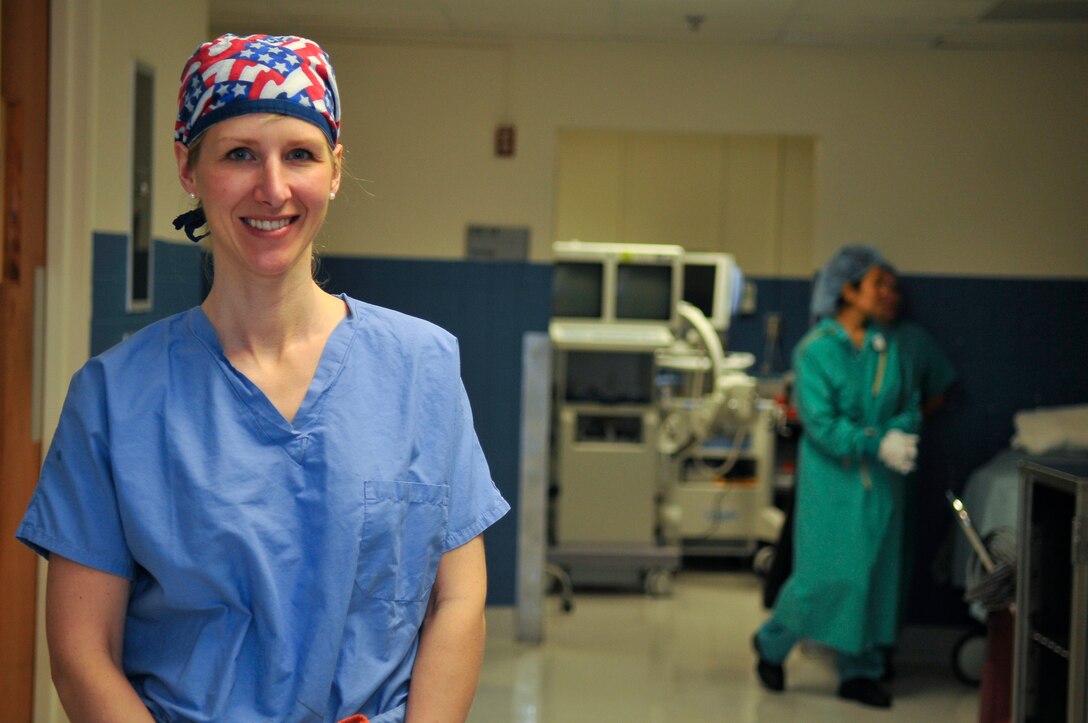 Dr. Eileen Dauer, 779th Surgical Operations Squadron, performs a septorhinoplasty and inferior turbinate reduction at Malcolm Grow Medical Center on Andrews Air Force Base, Md.  This procedure will help her patient breathe better through his nose and improve his quality of sleep.  Dr. Dauer is a Otolaryngologist (Ears Nose and Throat Clinic) at Malcolm Grow Medical Center.  National Doctor's Day is March 30th.  (U.S. Air Force photo by Tech. Sgt. Suzanne M. Day)(Released)
