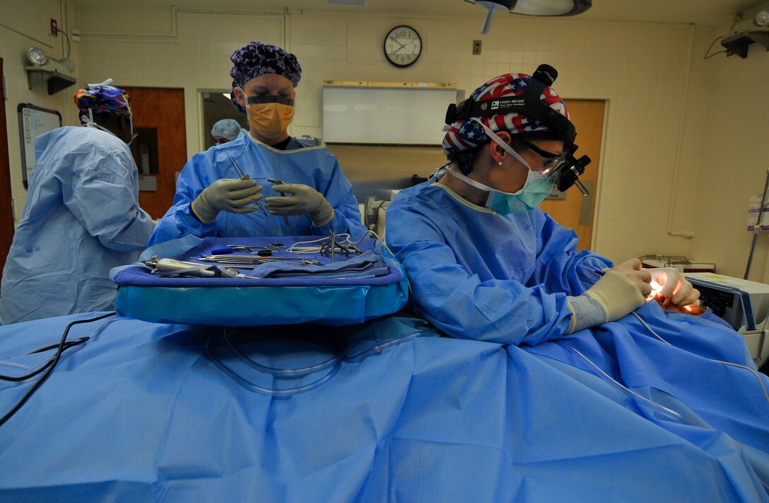 Dr. Eileen Dauer, 779th Surgical Operations Squadron, performs a septorhinoplasty and inferior turbinate reduction at Malcolm Grow Medical Center on Andrews Air Force Base, Md.  This procedure will help her patient breathe better through his nose and improve his quality of sleep.  Dr. Dauer is a Otolaryngologist (Ears Nose and Throat Clinic) at Malcolm Grow Medical Center.  National Doctor's Day is March 30th.  (U.S. Air Force photo by Tech. Sgt. Suzanne M. Day)(Released)
