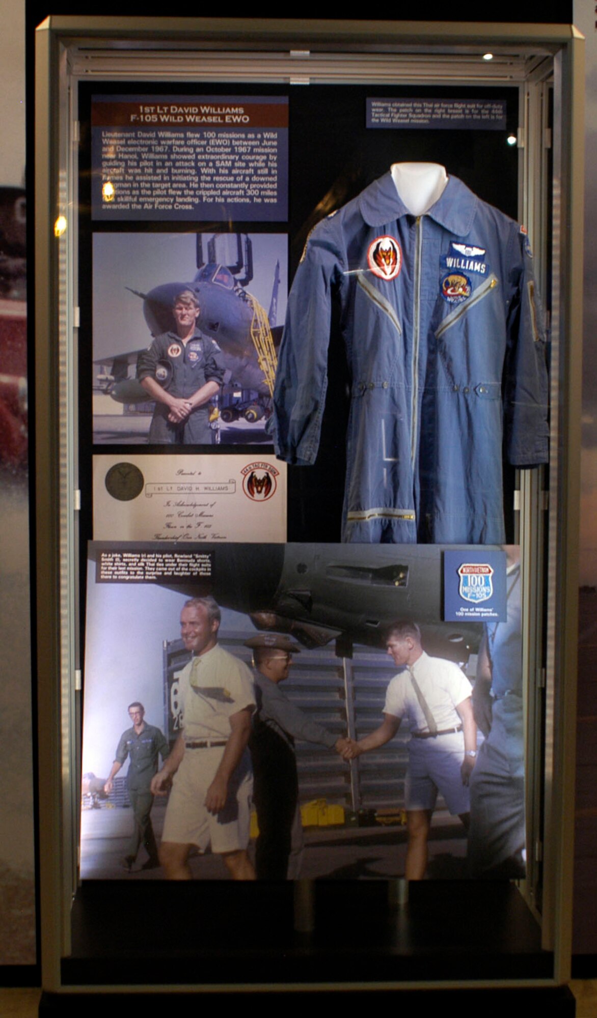 DAYTON, Ohio - 1st Lt. David Williams obtained this Thai air force flight suit for off-duty wear. The patch on the right breast is for the 44th Tactical Fighter Squadron and the patch on the left is for the Wild Weasel mission. Also displayed is one of Williams’ 100 mission patches. (U.S. Air Force photo)