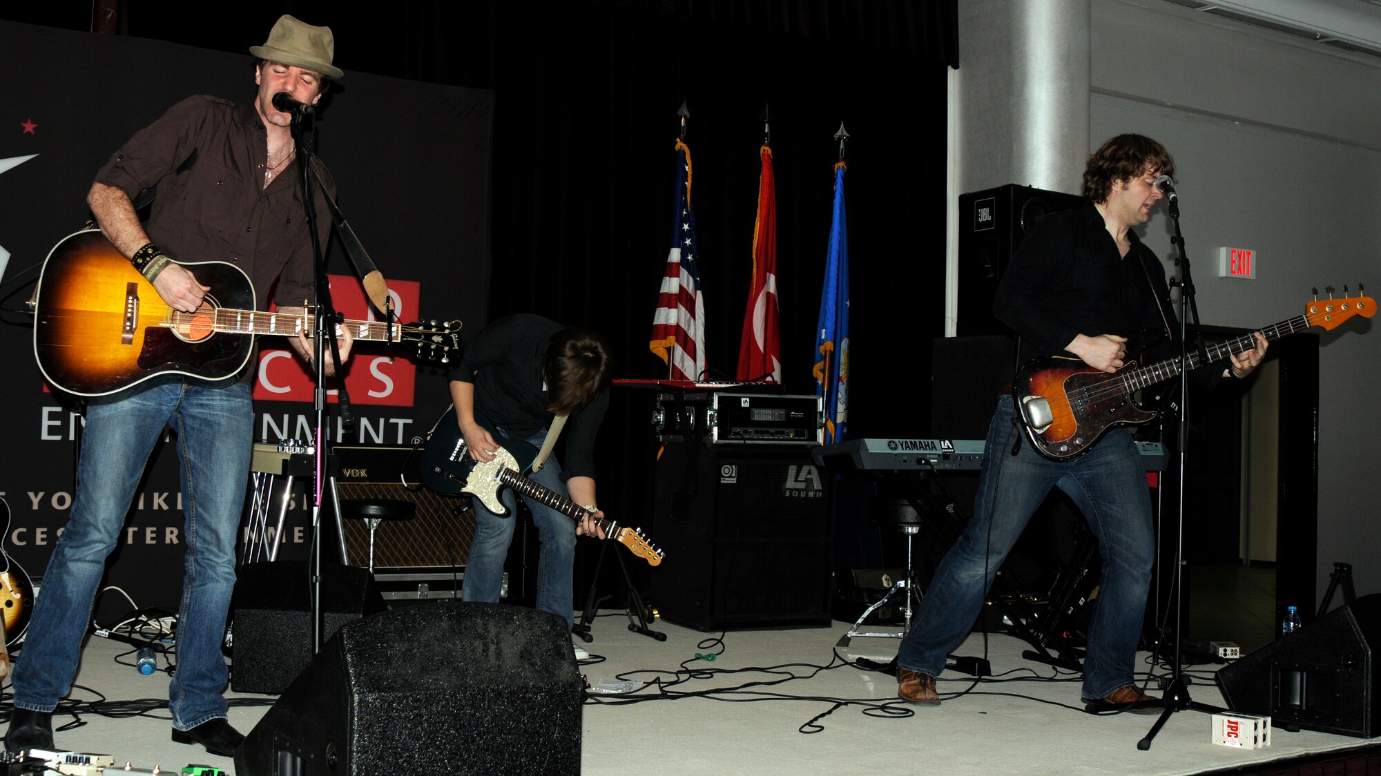 Stephen Kellogg, Sam Getz and Kit Karlson, members of “Stephen Kellogg and the Sixers” band, jam out during a performance March 20 at Incirlik’s Consolidate Club. The performance was part of an Armed Forces Entertainment tour to boost morale at several military bases in different countries. (U.S. Air Force photo/Airman 1st Class Amber Russell)
