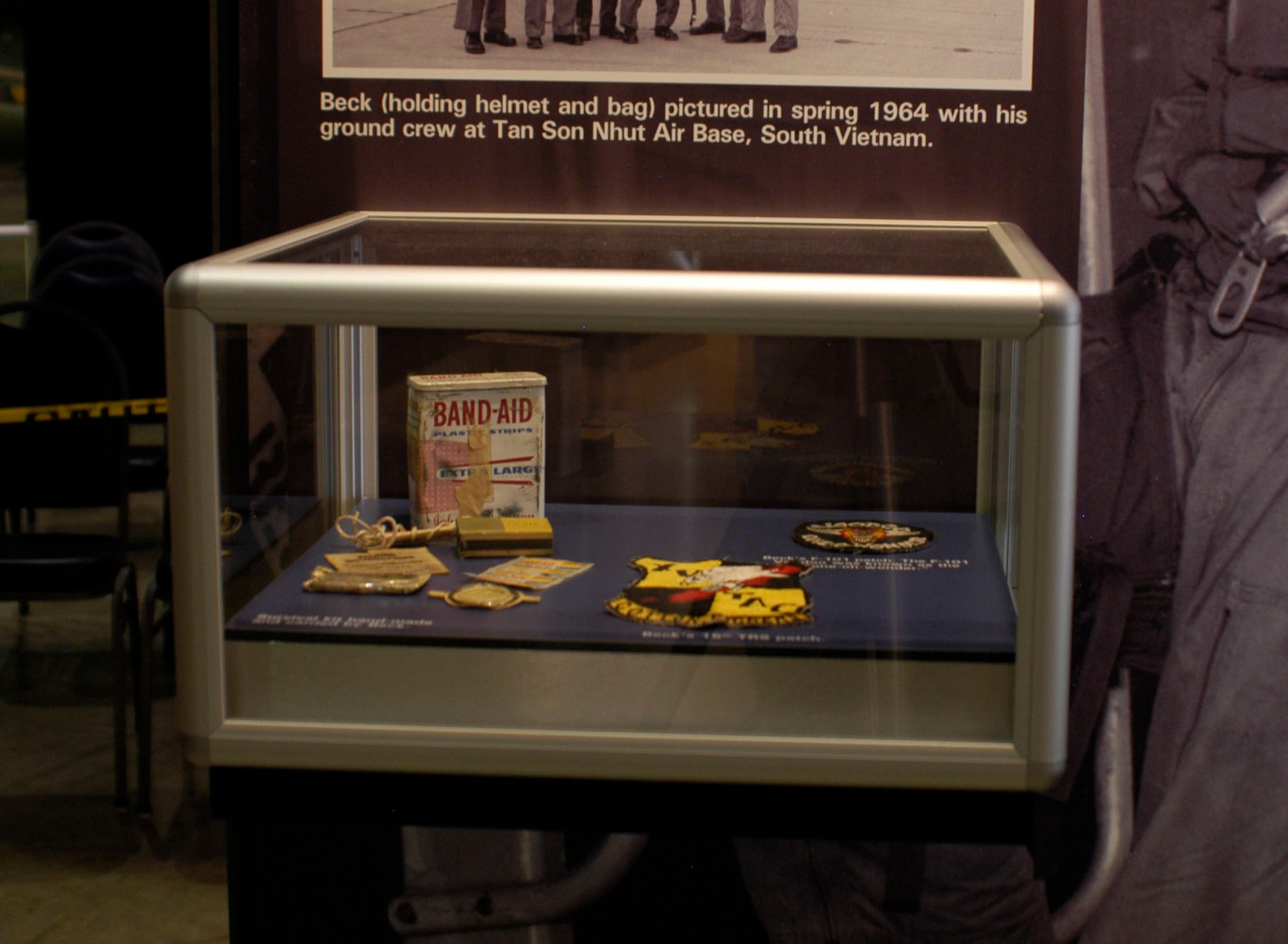 DAYTON, Ohio - Survival kit hand-made and carried by Capt. Donald Beck, the first pilot to reach 100 "counters". Also displayed is Beck’s F-101 patch (the F-101 Voodoo was known as the “one-oh-wonder.”) and his 15th TRS patch. These items are on display in the 100 Missions Up North exhibit in the Southeast Asia War Gallery at the National Museum of the U.S. Air Force. (U.S. Air Force photo)