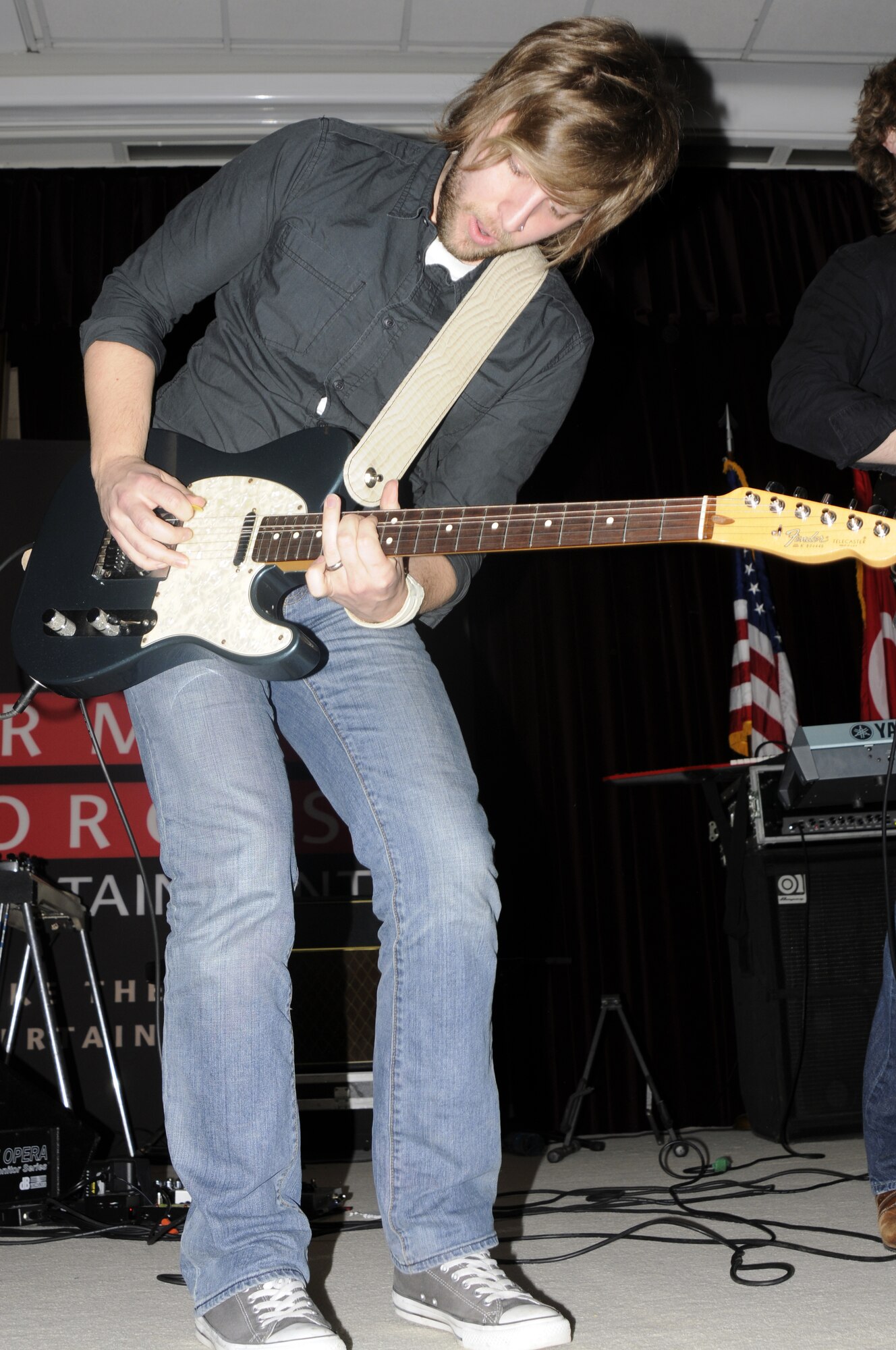Sam Getz, lead guitarist for “Stephen Kellogg and the Sixers,” gets into one of the set songs during a performance March 20 at Incirlik’s Consolidated Club. The show was a part of an Armed Forces Entertainment tour to boost morale at several military bases in different countries. (U.S. Air Force photo/Airman 1st Class Amber Russell)