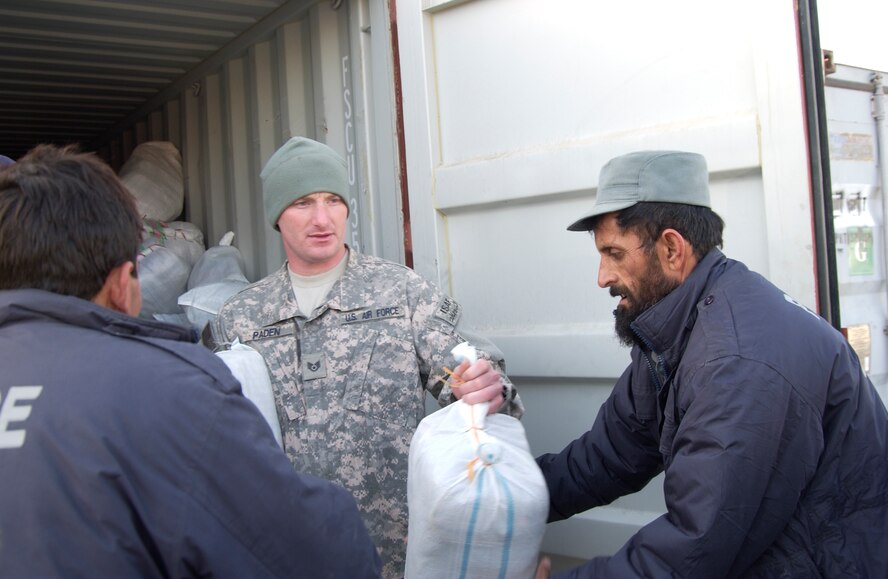 Nearly 200 children waited anxiously as Staff Sgt. Josh Paden and the members of the Zabul Provincial Reconstruction Team distributed the boxes filled with donations. Sergeant Paden, with the help of his mother, Diane Paden and the Pendleton County community in West Virginia, were able to give shoes, clothes and toys to the children of Qalat City, Afghanistan. (U.S. Air Force photo by 1st Lt. Amber Balken)