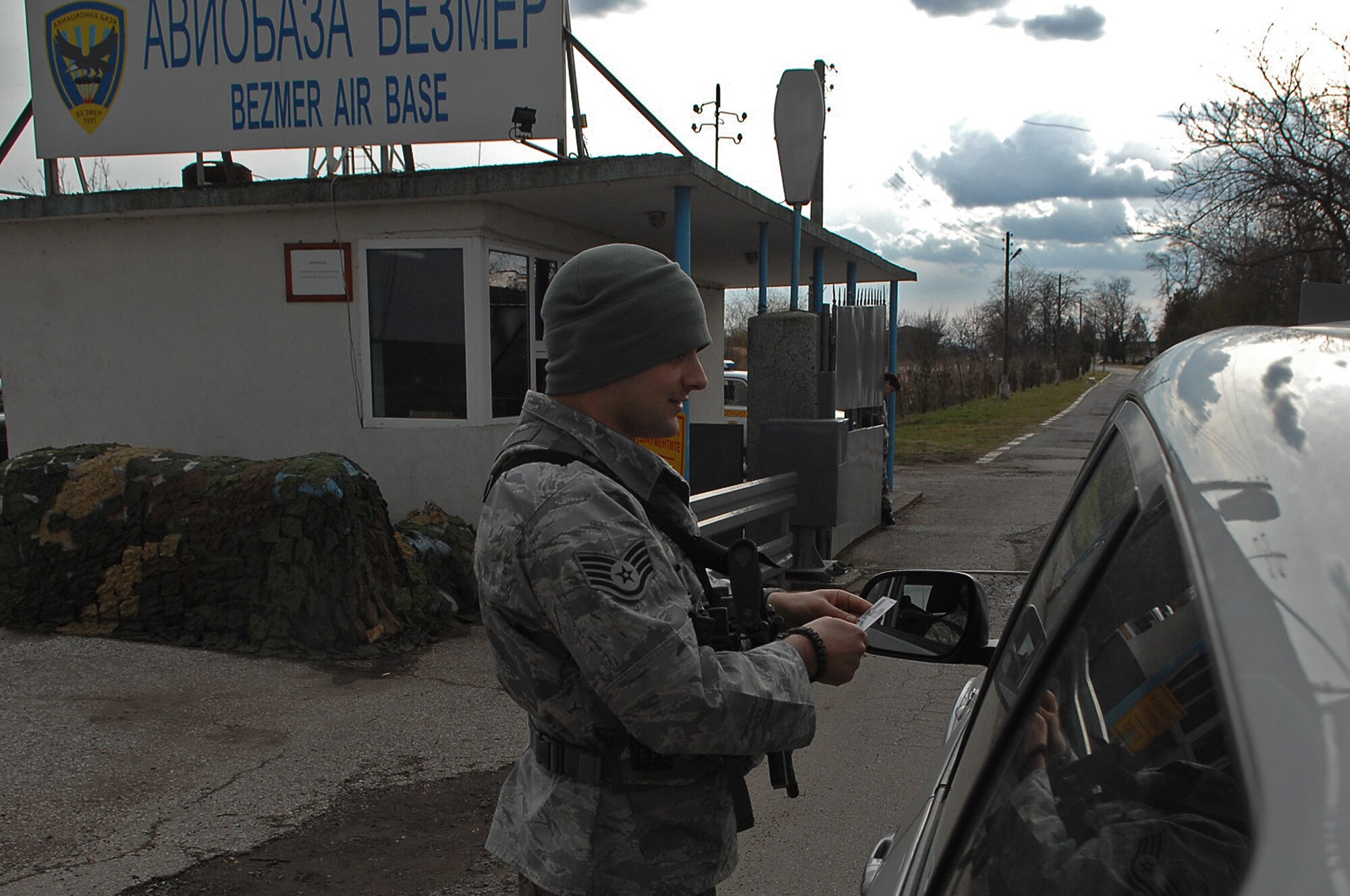 Staff Sgt. Daniel Spivey, 786th Security Forces Squadron paratrooper, is on duty as an entry controller for Bezmer Air Base, Bulgaria. Members of the 786th SFS, like Staff Sgt. Spivey, took turns augmenting Bulgarian Air Force security forces in providing base security during Operation Thracian Spring, March 11, 2009. This exercise was first conducted in 2007, and is the third annual cooperative endeavor of the 86th Contingency Readiness Squadron, the 37th Airlift Squadron and the Bulgarian Armed Forces. (U.S. Air Force photo by Airman 1st Class Tony R. Ritter)