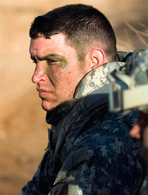 U.S. Army Sgt. Chad A. Touchet relaxes after completing the weapons knowledge event of the 3rd Sustainment Command's sustainer challenge on Joint base Balad, Iraq, March 18, 2009. Touchet, a communications noncommissioned officer assigned to Headquarters Detachment, 330th Transportation Battalion, was presented with the Warrior Spirit Ethos Award for his preparation, dedication, and team spirit.