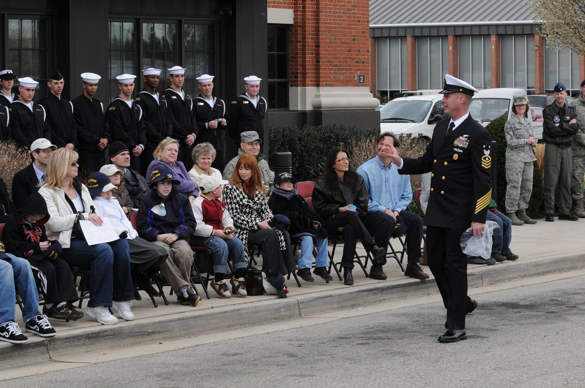 Master Chief Petty Officer Christopher Adams talks to children and family members from the Make-A-Wish Foundation March 20 on Bolling, introducing the Navy Ceremonial Guardsmen. The Make-A-Wish Foundation has been granting wishes to children with progressive, degenerative or malignant conditions since 1980 and has reached more than 167,000 children around the world. (U.S. Air Force photo by Senior Airman Sean Adams)
