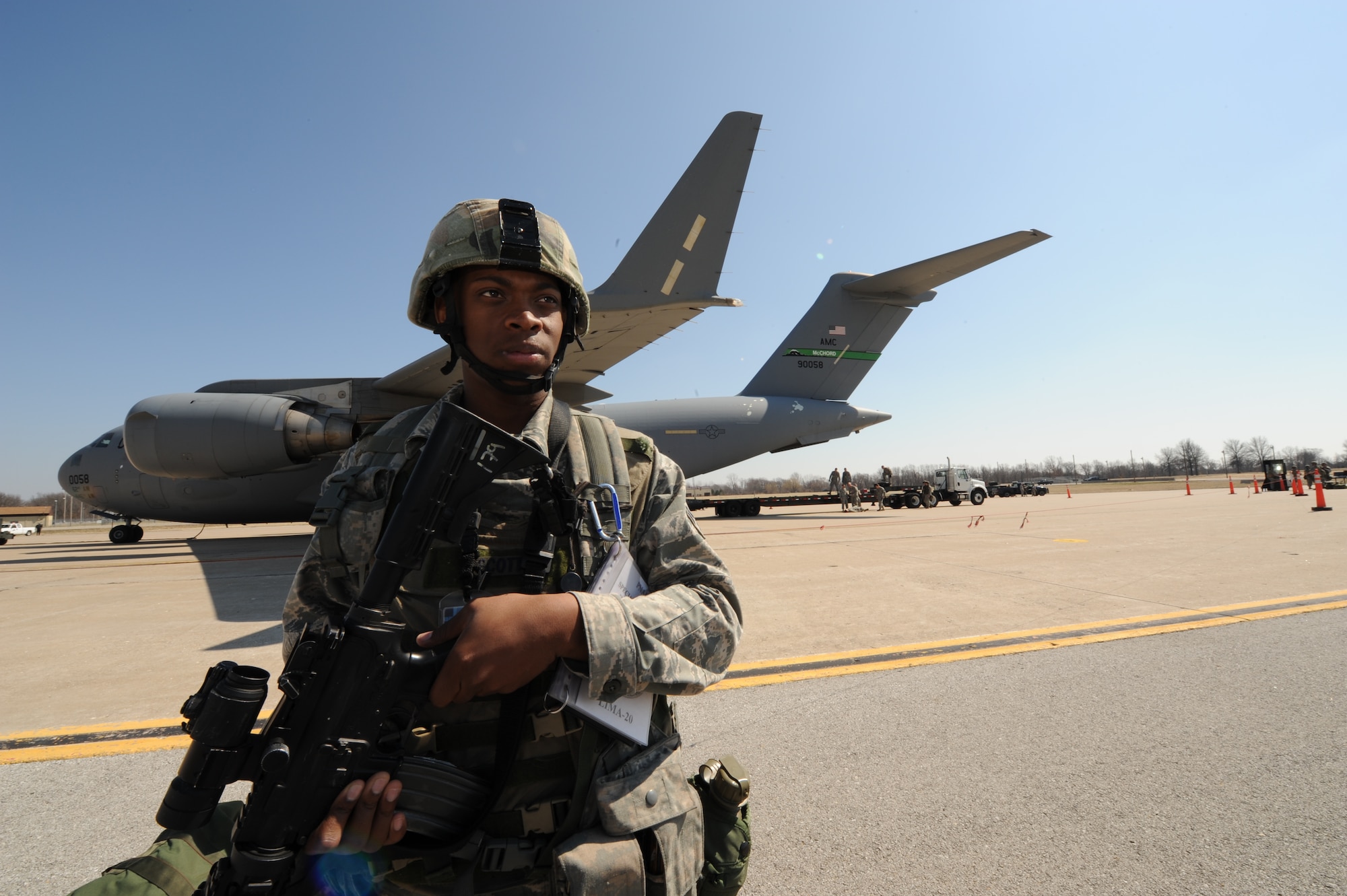 WHITEMAN AIR FORCE BASE, Mo. – Airman 1st Class Phillip Scott, 509th Security Forces Squadron, provides security for a C-17 Globemaster III from McChord AFB during a Nuclear Surety Inspection March 16. (US Air Force Photo/Staff Sgt. Charles Larkin)