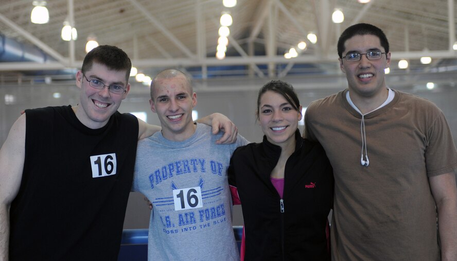 MINOT AIR FORCE BASE, N.D. -- Winners of the St. Patrick's Day 6-mile relay race, "Team NUKE-U", all representing the 5th Munitions Squadron, pose for a post-race photo at the McAdoo Fitness Center here March 17. The Relay race consisted of four team members (at least one female) and each member was required to run 1.5 miles. (U.S. Air Force photo by Senior Airman Sharida Jackson)