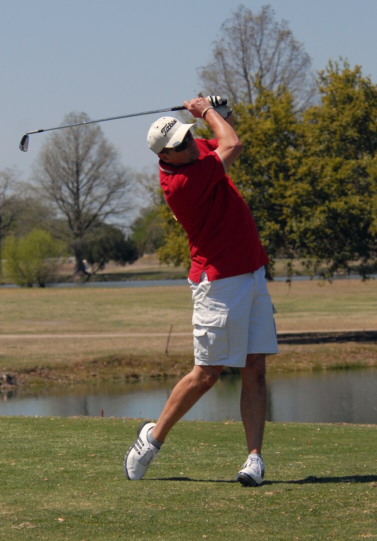Jim Stevenson, Air Education and Training Command, tees off at the Team Randolph Airman's Council Air Force Assistance Fund Golf Tournament on March 20. The TRAC sponsored the tourney to raise funds for AFAF. (U.S. Air Force photo by Steve White)