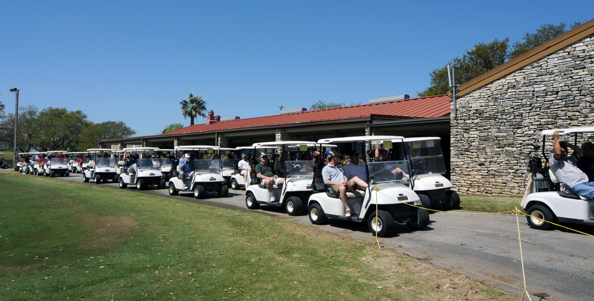 Golfers rev up to tee off at the Team Randolph Airman's Council Air Force Assistance Fund Golf Tournament on March 20. The TRAC sponsored the tourney to raise funds for AFAF. (U.S. Air Force photo by Steve White)