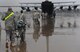 In Mosul, Iraq, Soldiers walk patients on litters to a 777th Expeditionary Airlift Squadron C-130 Hercules for transport on an aeromedical evacuation mission to Joint Base Balad, Iraq, Feb. 27, 2009. (U.S. Air Force photo/Senior Airman Elizabeth Rissmiller)