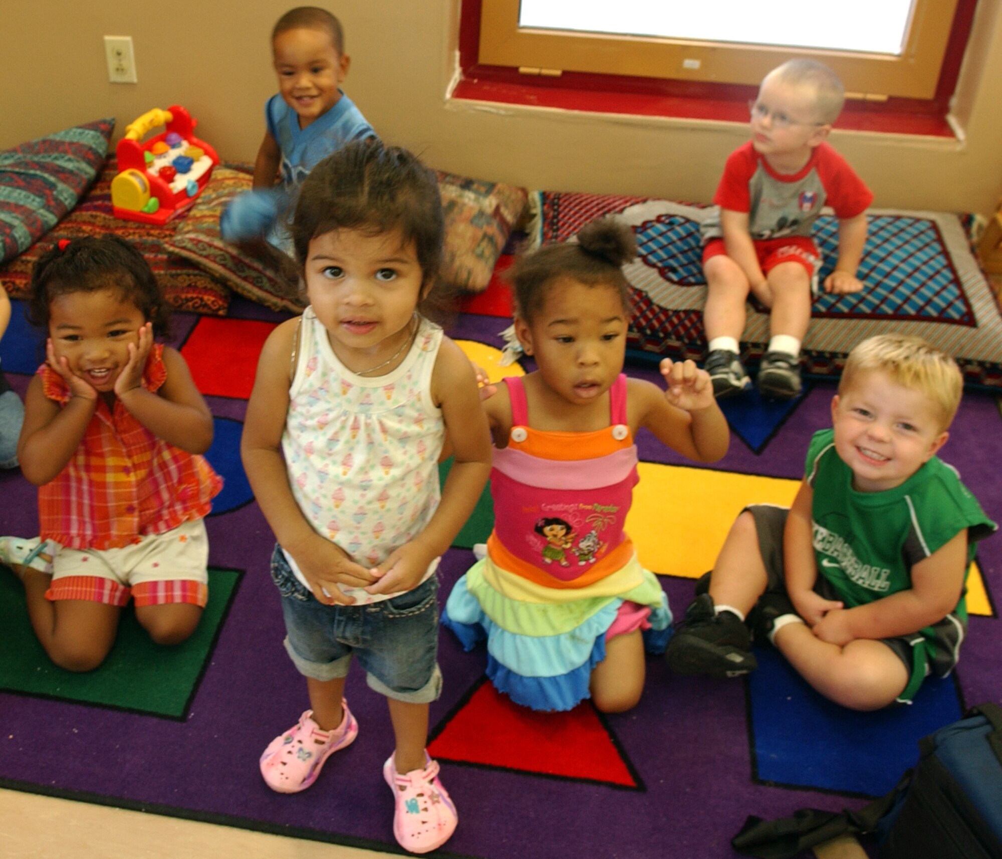 Children listen intently during an event at the Incirlik Child Development Center last summer.  The CDC and Youth Program were recently honored as Best in United States Air Forces in Europe for 2008.  The CDC is currently expanding its curriculum in numerous ways to accomodate more children and provide more comprehensive programs for the base populace. (U.S. Air Force photo/ Airman 1st Class Amber Russell)