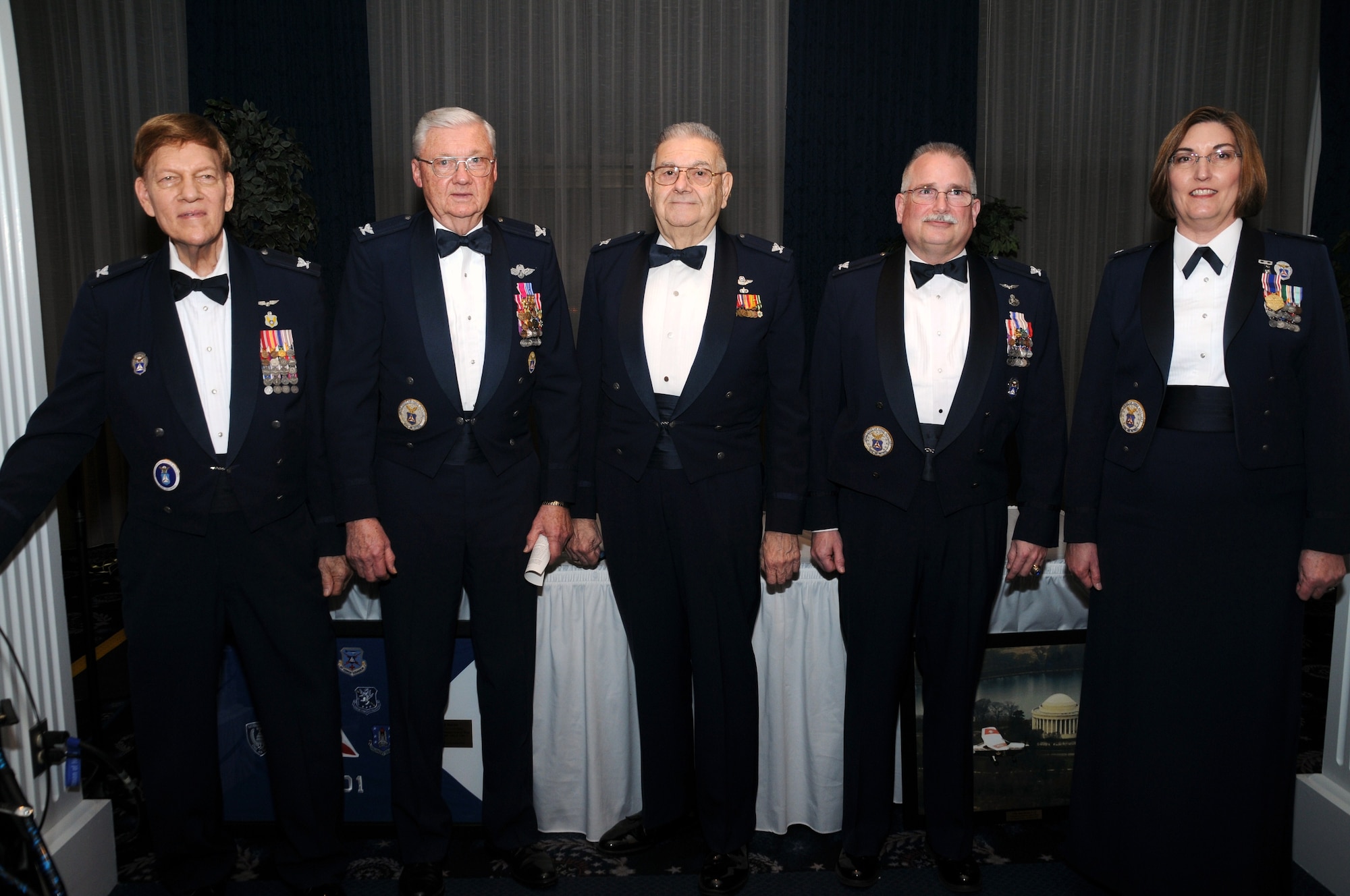 From left to right, former CAP’s National Capital Wing commanders Cols. Charles Suraci, 1974-1976; Gene Hartman, 1992-1995; Stanley Voyiaziakis, 1995-1996; Frank McConnell, 2000-2004; and Jane Davies, 2004-2009 poses for a photo March 14 at the Bolling Club. (Photo by C. Todd Lopez)