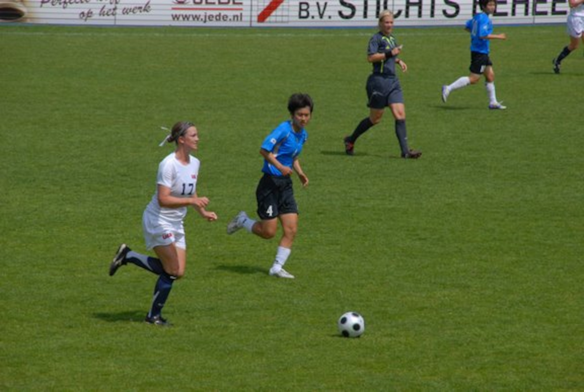 HANSCOM AIR FORCE BASE, Mass. – First Lieutenant Jamie Andrews (white uniform) dribbles the ball downfield during a game against South Korea in the 2008 Conseil International Du Sport Militaire, an international tournament in which military teams from around the world compete in various sporting events. Lieutenant Andrews has played on the Women’s Armed Forces soccer team for the past three years and is setting her sites on once again representing her country at this year’s competition which will take place at Keesler Air Force Base June 4 to 14. Lieutenant Andrews is assigned to the 554th Electronic Systems Wing at Hanscom AFB. (Courtesy photo)