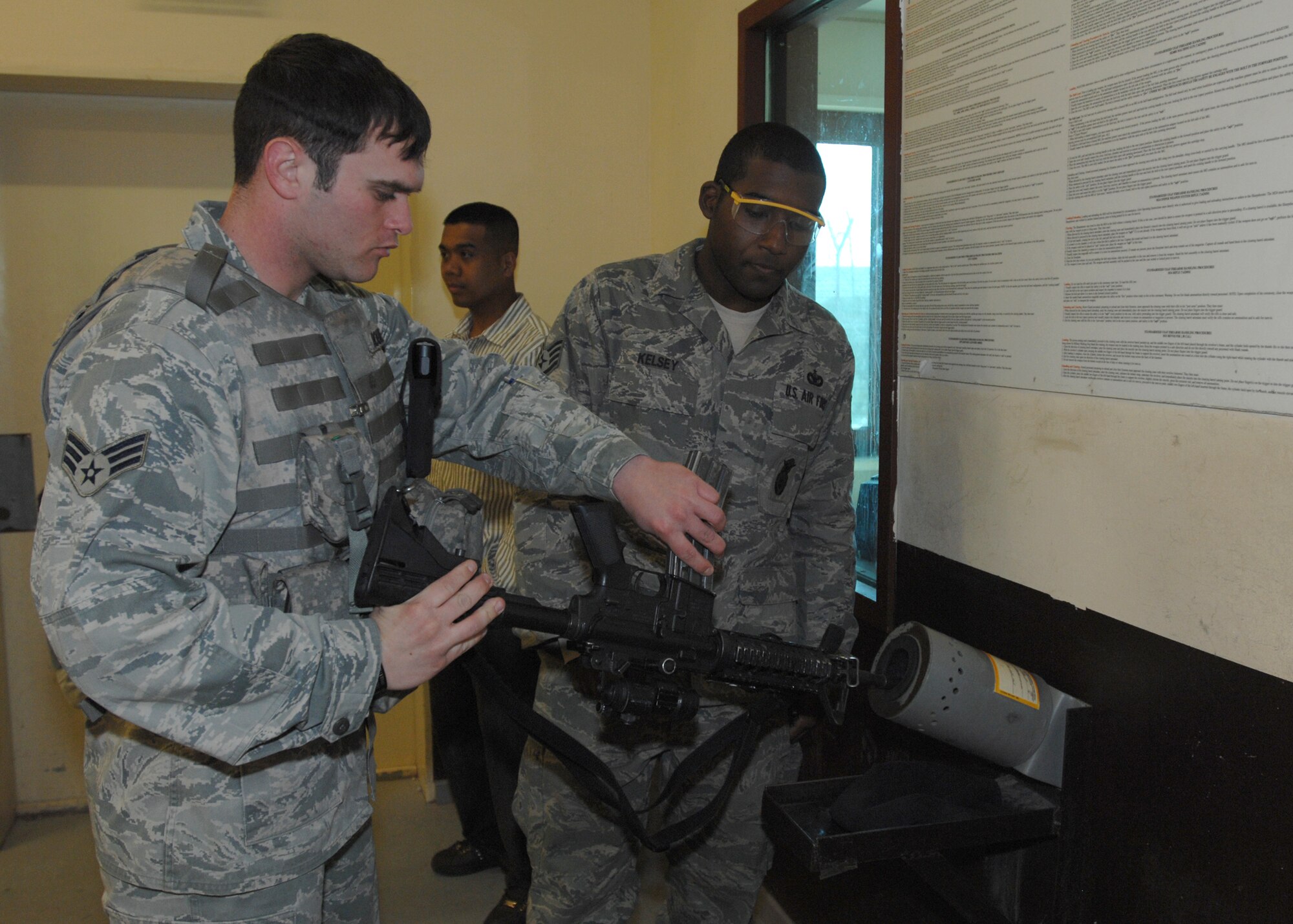 Senior Airman Joseph Rouse, 31st Security Forces Squadron, clears his weapon before guardmount March 20 at the base armory.  The 31st SFS maintains installation force protection during peacetime and wartime operations to eight geographically separated locations within the Aviano community. (U.S. Air Force photo/Airman 1st Class Tabitha M. Mans)