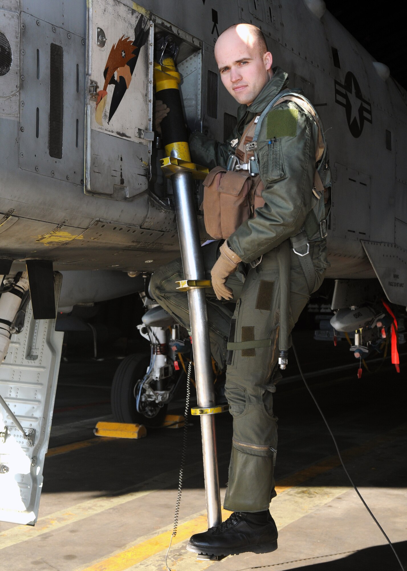 SPANGDAHLEM AIR BASE, Germany -- Capt. Travis Burton, 81st Fighter Squadron, prepares for flight March 20, 2009. Captain Burton earned the 2009 Colonel James Jabara Award for Airmanship. He distinguished himself through heroic actions while serving as A-10 flight lead at Bagram Air Base, Afghanistan. (U.S. Air Force photo by Airman 1st Class Staci Miller)