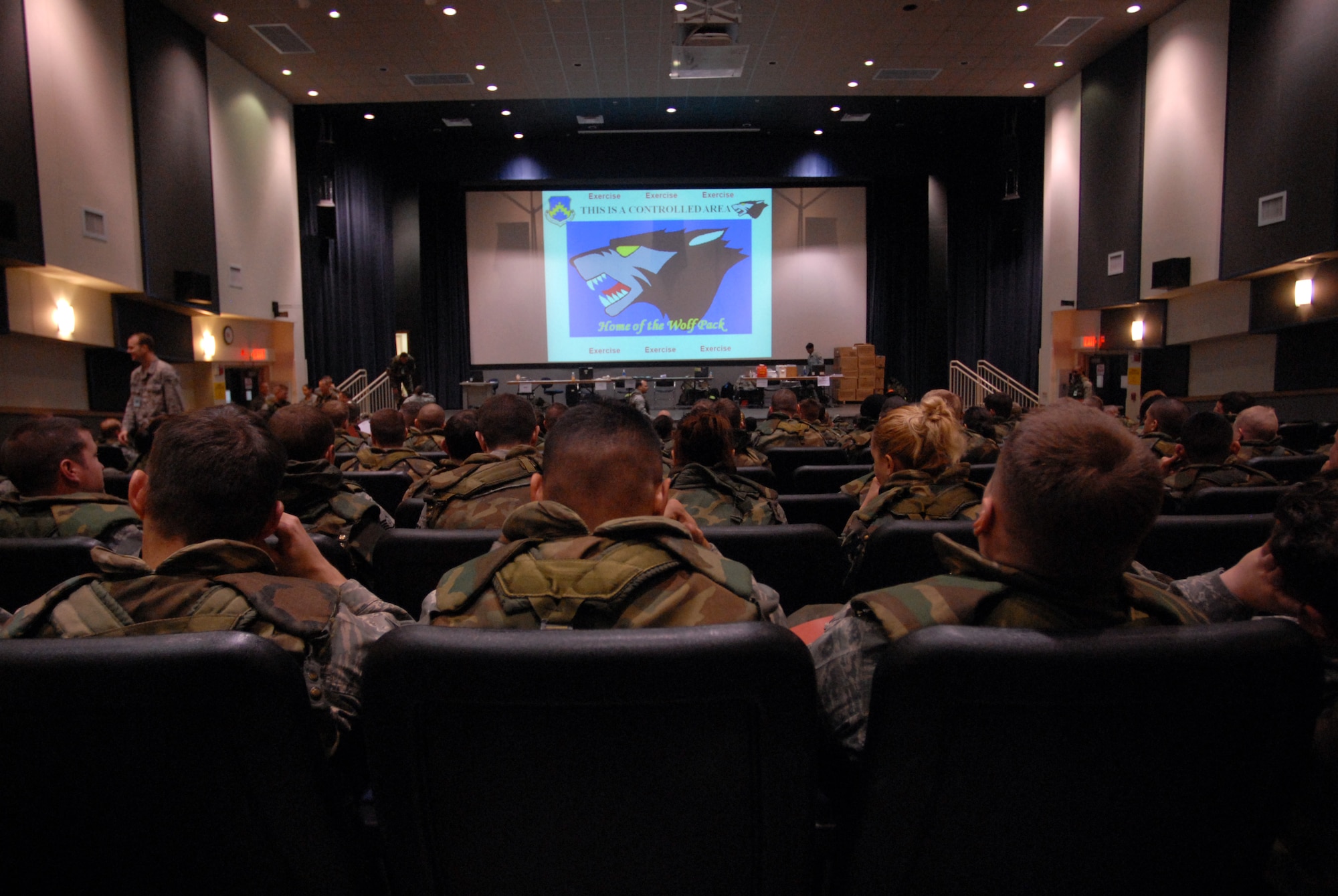 More than 200 Airmen wait to process through the Personnel Deployment Reception Function during Wolf War day at Kunsan Air Base, Republic of Korea, March 23, 2009. The 8th Fighter Wing Airmen participate in Wolf War day practicing their war time capabilities in preparation for the Peninsula Wide Operational Readiness Exercise and Inspection. (US Air Force photo By: Senior Airman Angela Ruiz) 