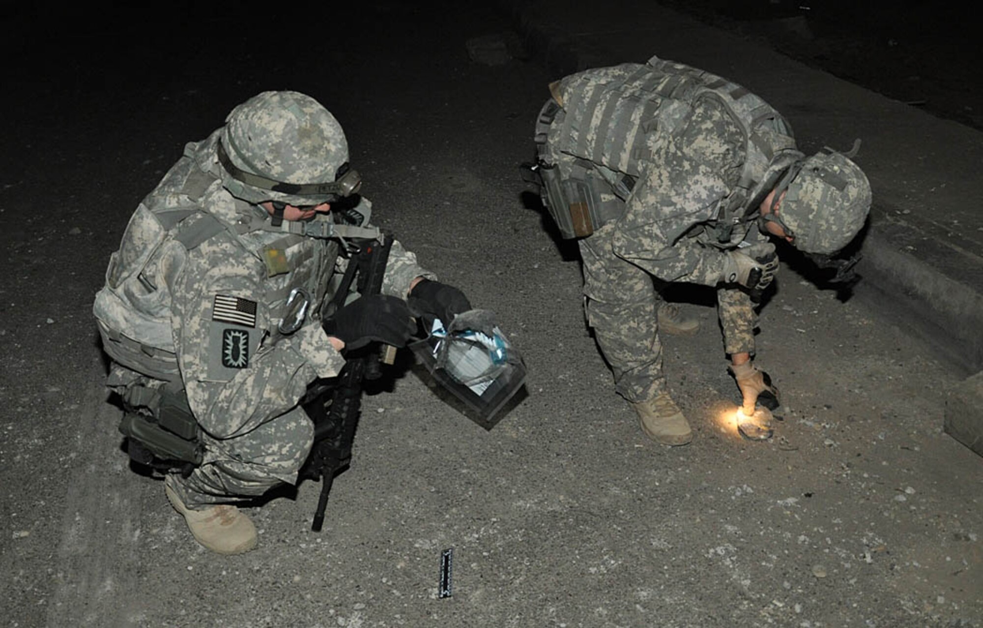 Members of the Weapons Intelligence Team provide counter improvised explosive device intelligence through collection, analysis and tactical exploitation in support of Multi-National Corps Iraq.  As part of the Combined Joint Task Force Troy, the WIT is made up of personnel from the Air Force, Army, and Navy in a gamut of career fields. By collecting evidence and staying ahead of the enemy the WIT [helps prepare U.S. and coalition forces] prepare for future attacks.  (Courtesy photo)