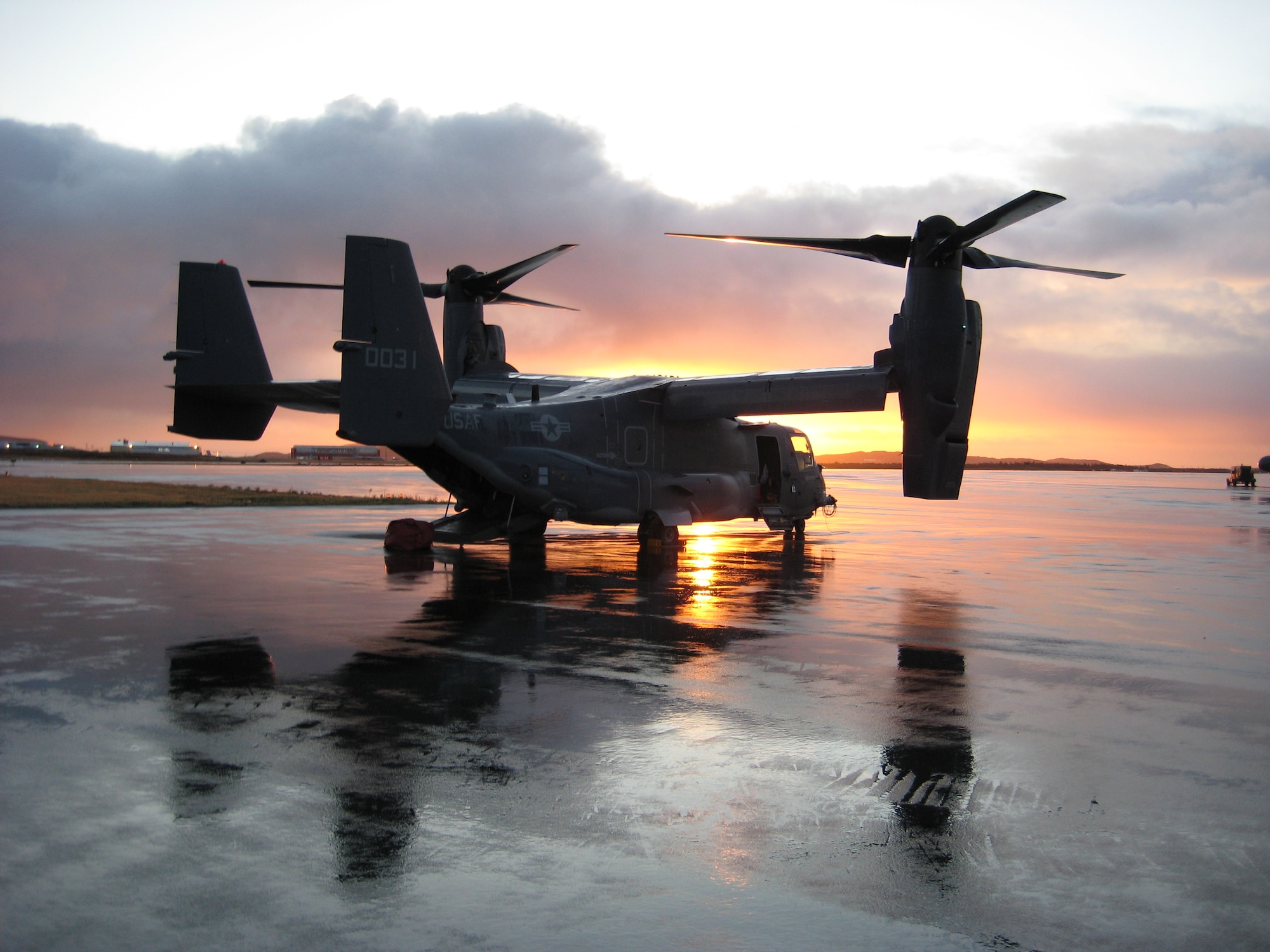 A CV-22 Osprey from the 8th Special Operations Squadron sits on the ramp during a maintenance stop en route to Mali, Africa to participate in Flintlock 09 in Oct. 2008. Flintlock is a regularly scheduled training exercise designed to forge partnerships and military interoperability among African nations and U.S. and coalition partners. (U.S. Air Force photo/Capt. Christian Helms)