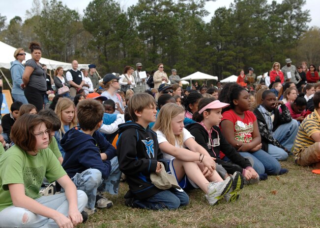 Charleston area elementary school students listen to Col. Frank Jones speak on Charleston AFB, March 25. More than 600 students came to the base's 13th annual Earth Day celebration. Colonel Jones is the 437th Mission Support Group commander. (U.S. Air Force photo/Senior Airman Katie Gieratz)
