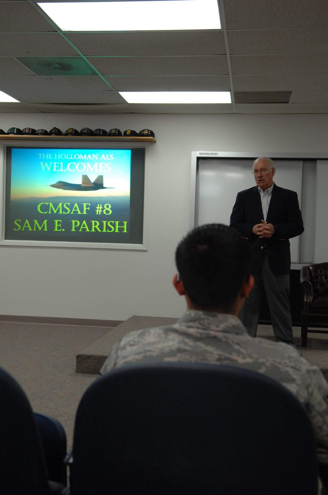 The 8th Chief Master Sgt. of the Air Force, Chief Master Sgt. Sam Parish (ret.) addresses Airmen at Airman Leadership School March 20 at Holloman Air Force Base, N.M. Chief Parish spoke to not only airmen, but Holloman's newest Chief Master Sergeants. (U.S. Air Force photo/SSgt Anthony Nelson Jr)