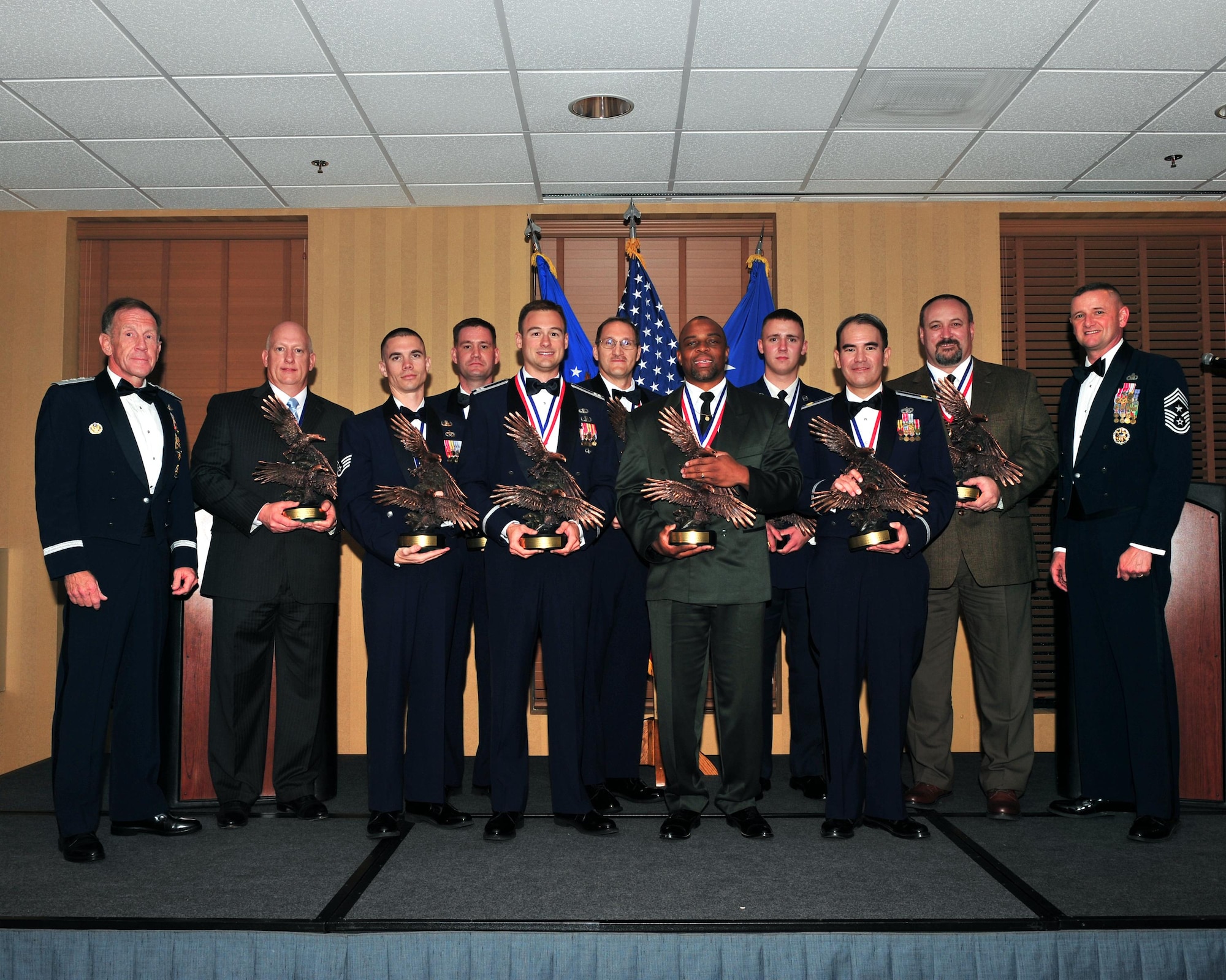 DAVIS-MONTHAN AFB, Ariz. -- Winners of the 2009 Twelfth Air Force (Air Forces Southern) Outstanding Performer of the Year awards are recognized during a ceremony here March 11, 2009.  The awards ceremony coincides with the annual Total Force Conference, a time for commanders and command chiefs from across the NAF to discuss a range of issues affecting the command. (U.S. Air Force photo by Senior Airman Noah R. Johnson)