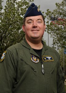 Major Steve Bruce, a reserve pilot with the 317th Airlift Squadron at Charleston AFB, S.C., recently graduated from law school.  (Air Force photo by/Captain Chett Collier) 

